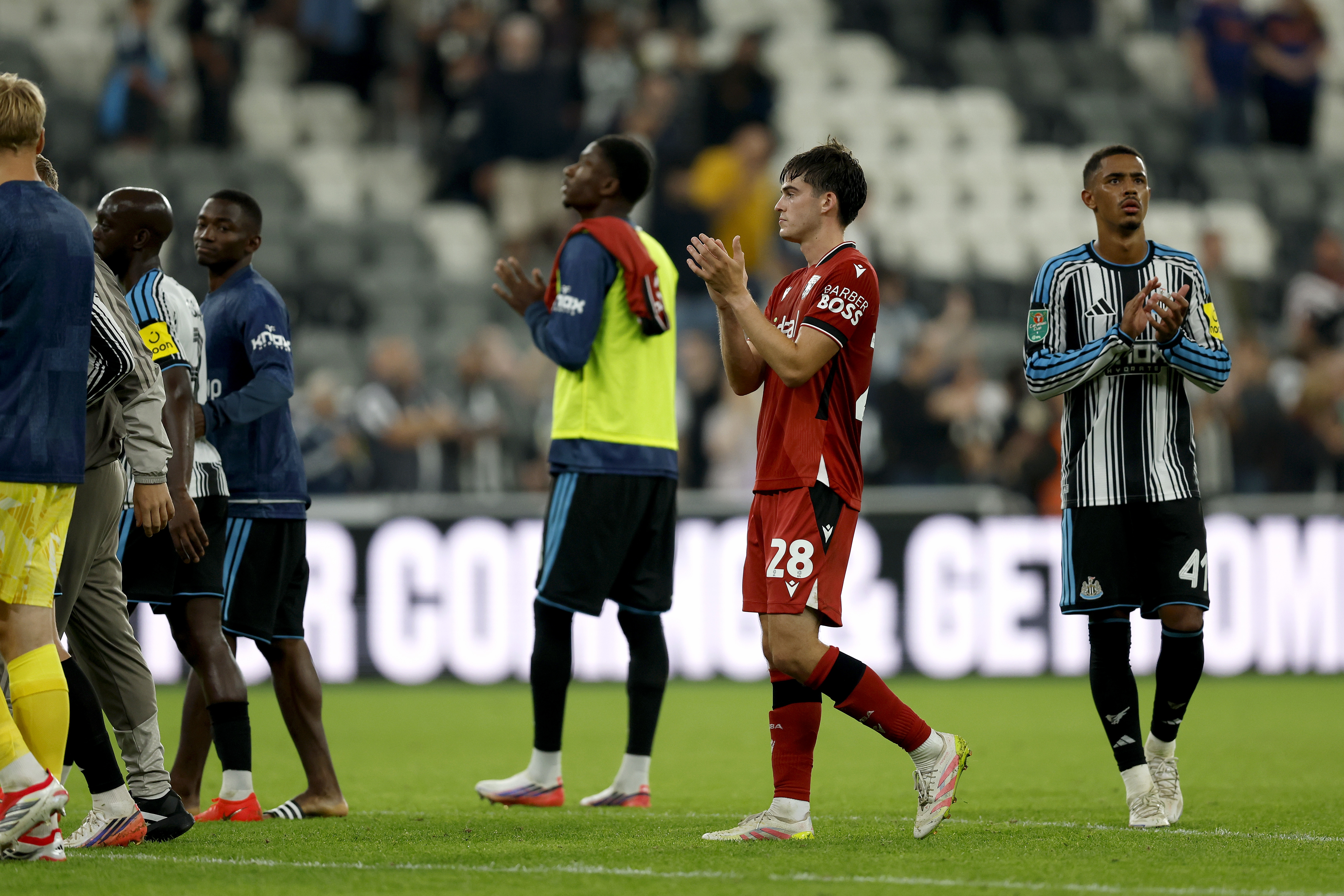 Alex Williams applauds the away fans at full-time