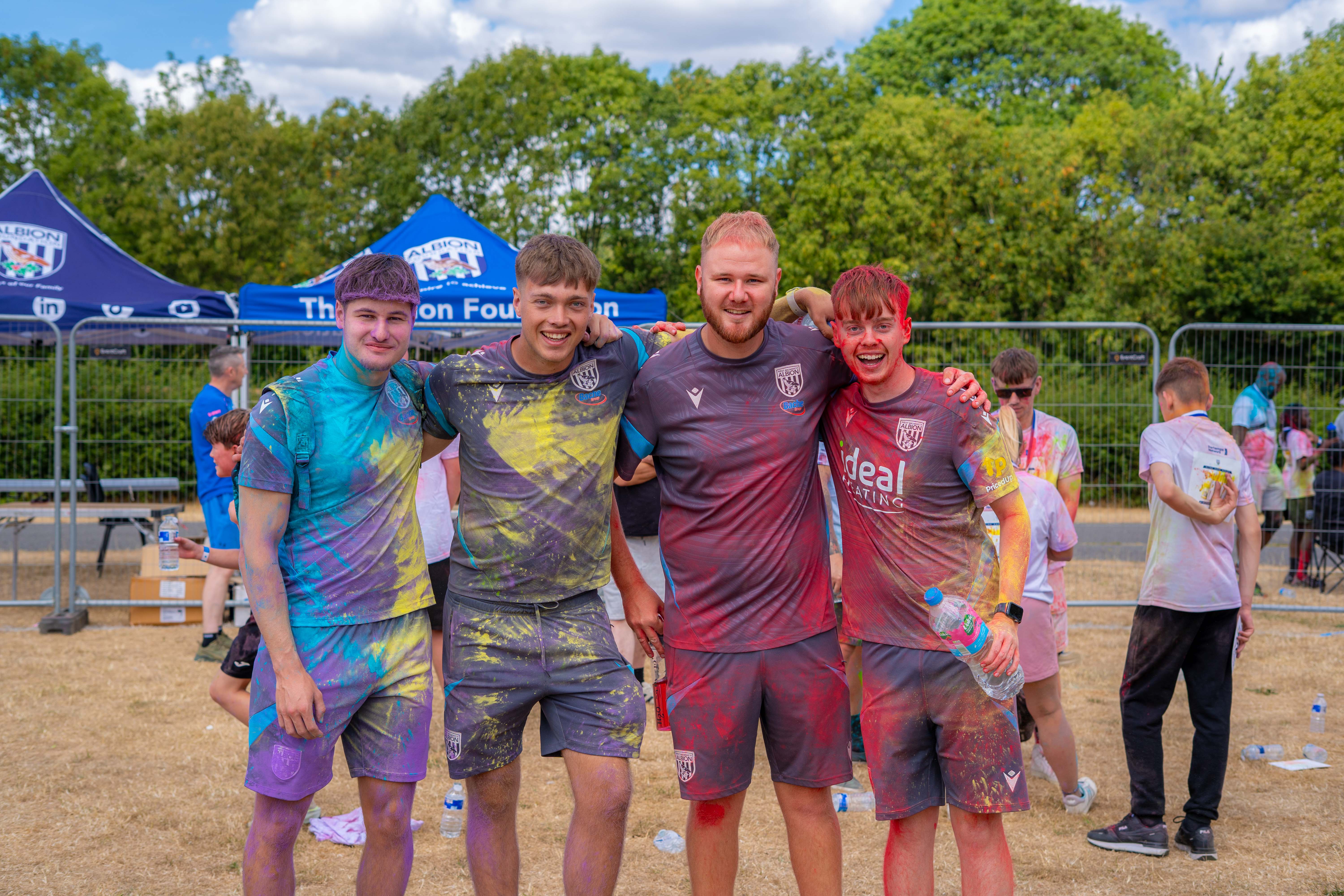 Foundation staff posing for a photo after the Colour Run.