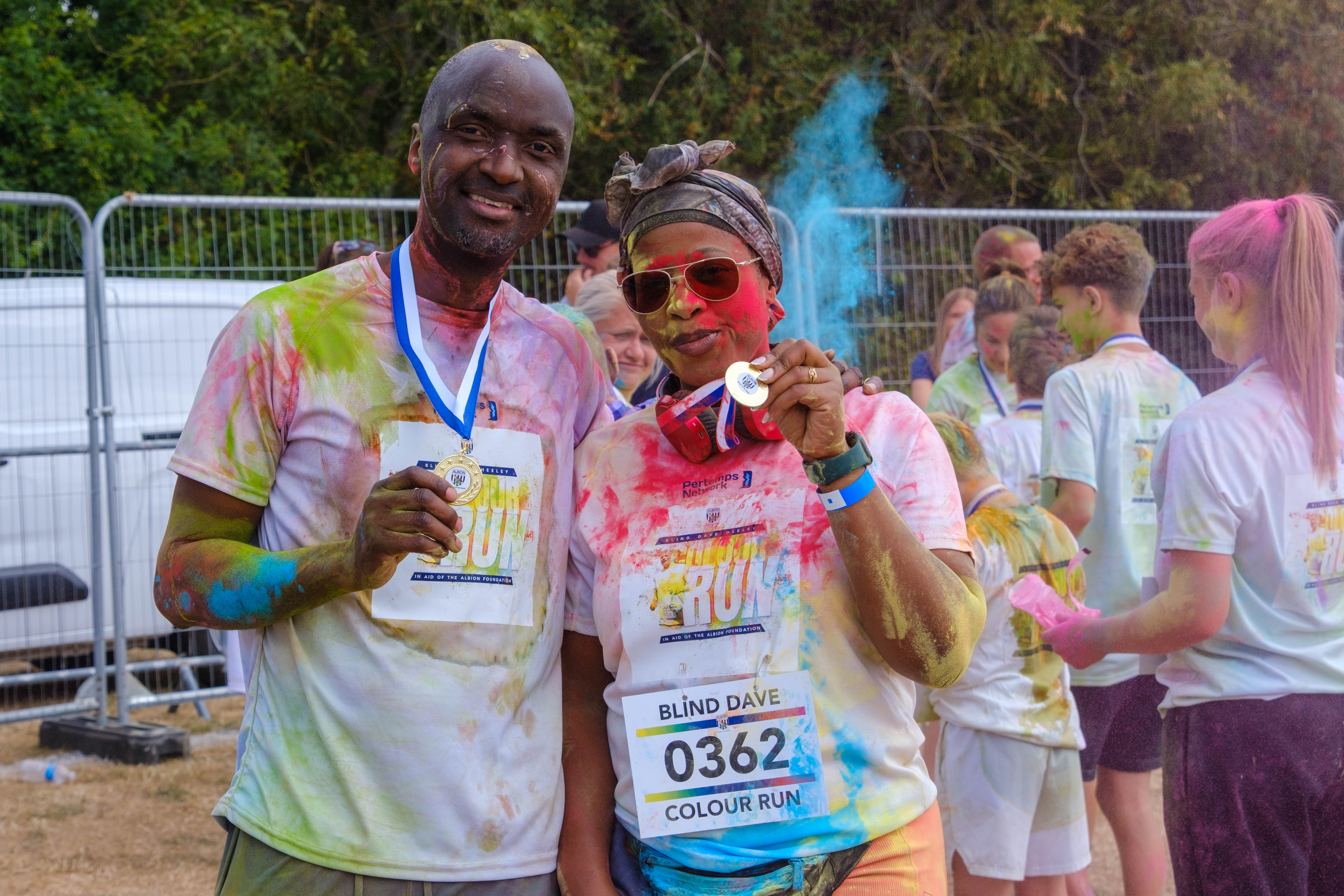 Two participants posing together after the run.