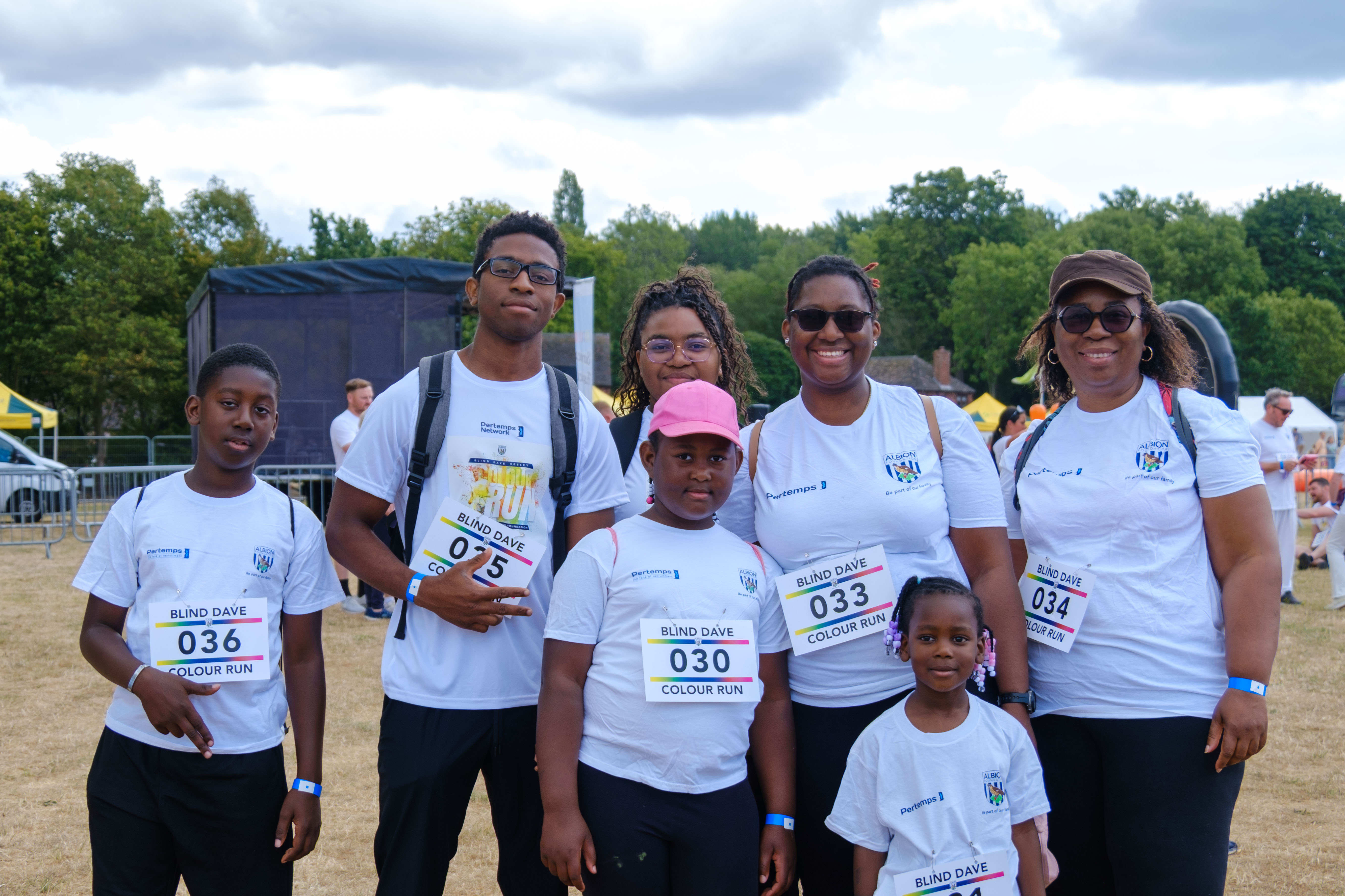 Participants posing for a photo before the Colour Run.