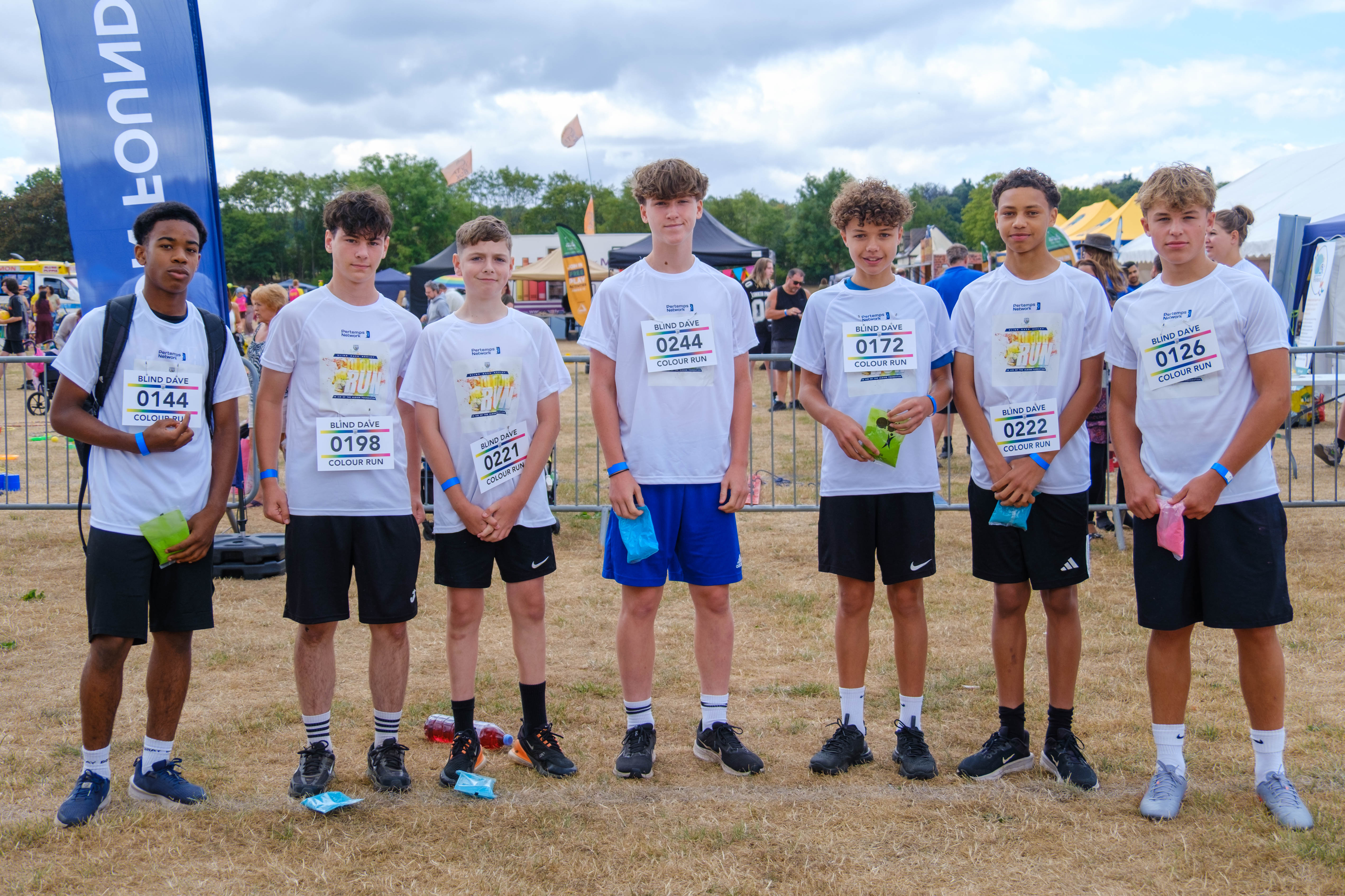 Participants posing for a photo before the Colour Run.