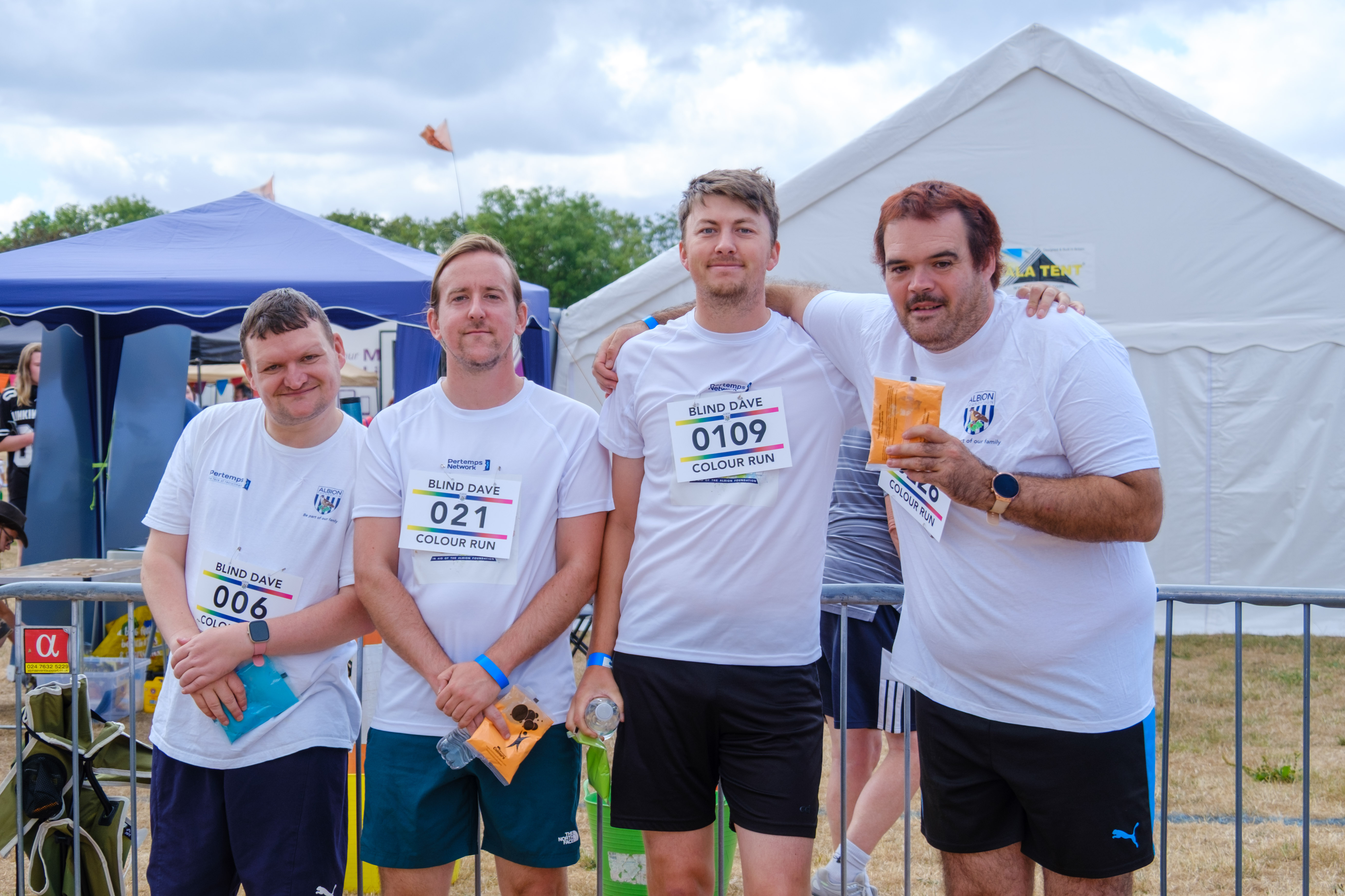 Participants posing for a photo before the Colour Run.