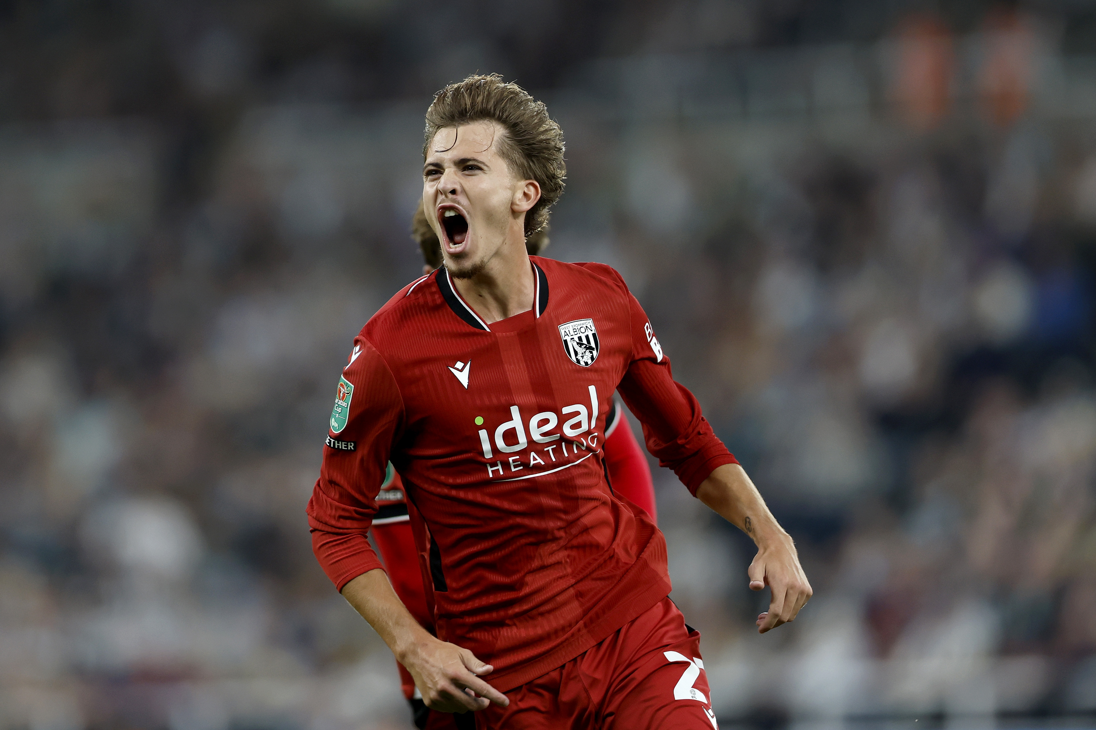 Isaac Price celebrates his second goal against Newcastle