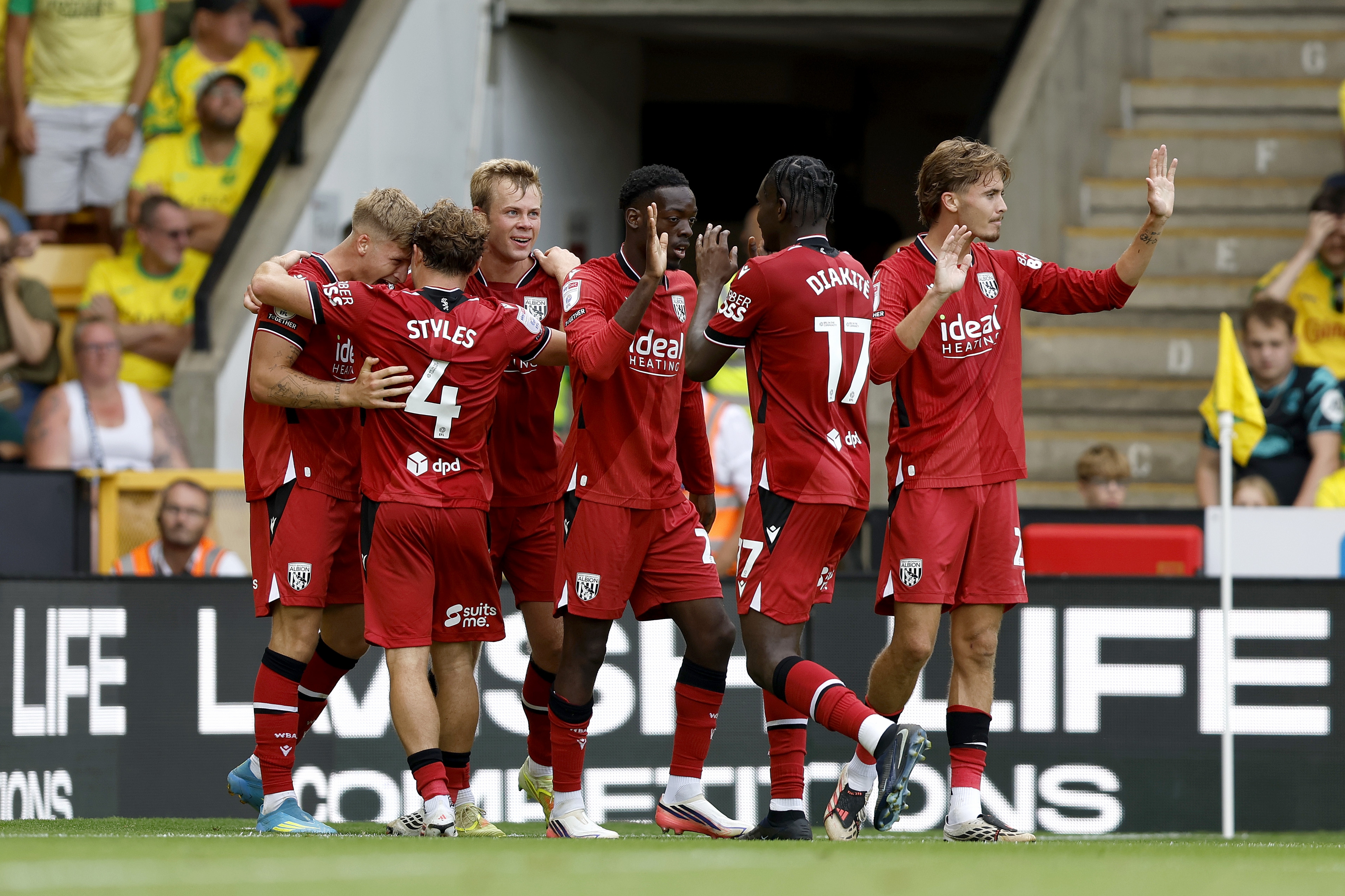 The team celebrate Aune Heggebo's opener at Carrow Road