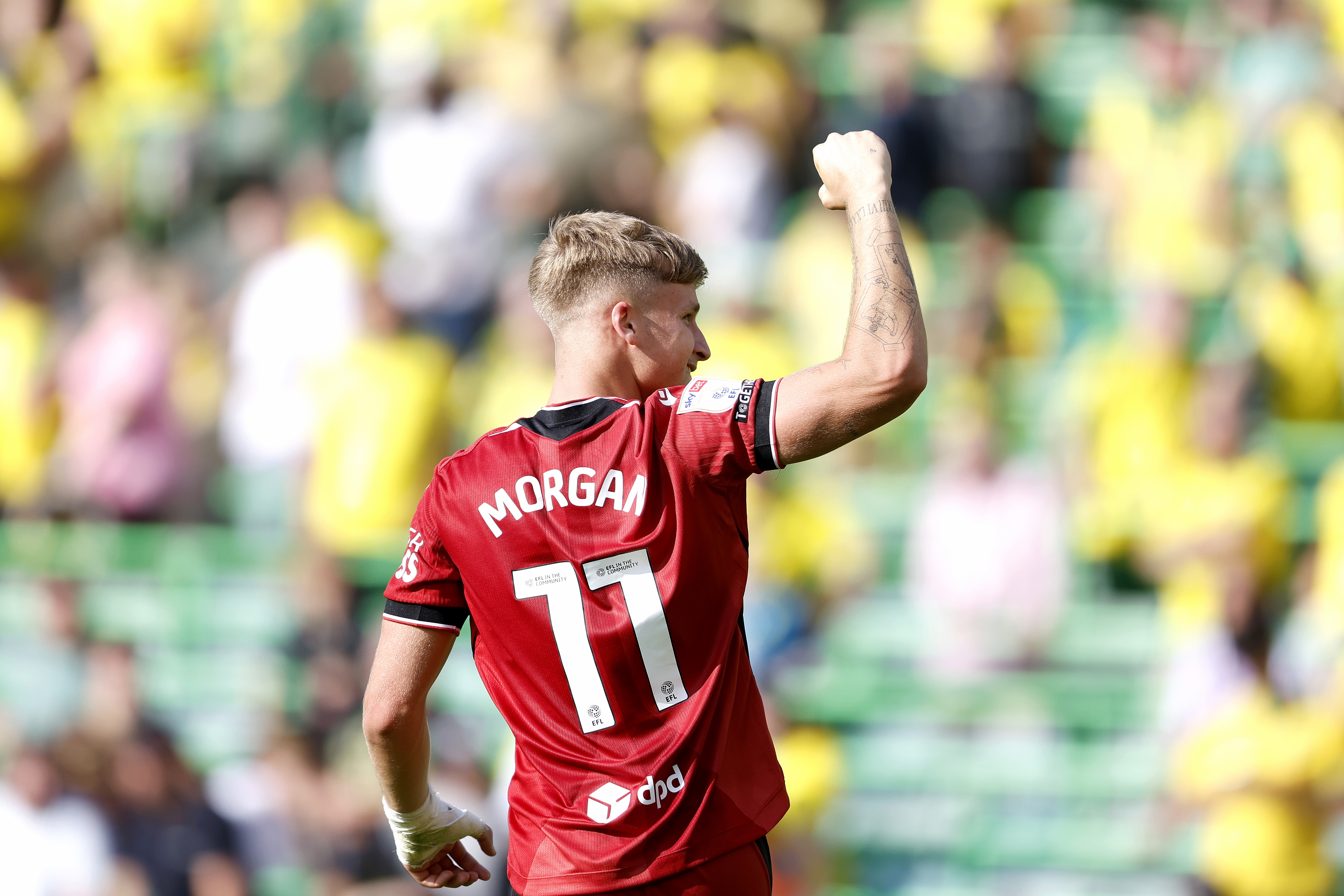 JJ Morgan celebrates his goal at Carrow Road