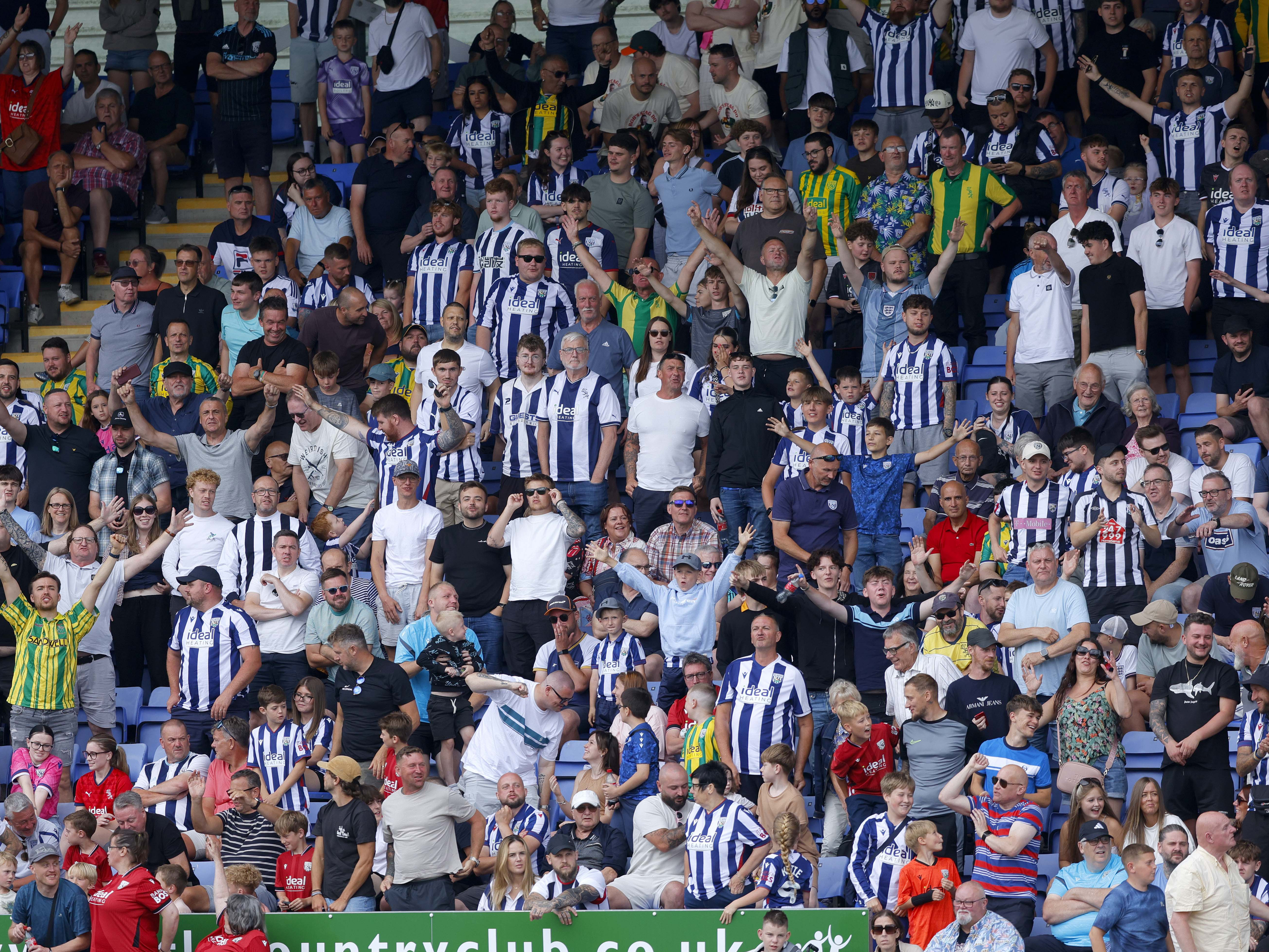 An image of Albion supporters in an away end