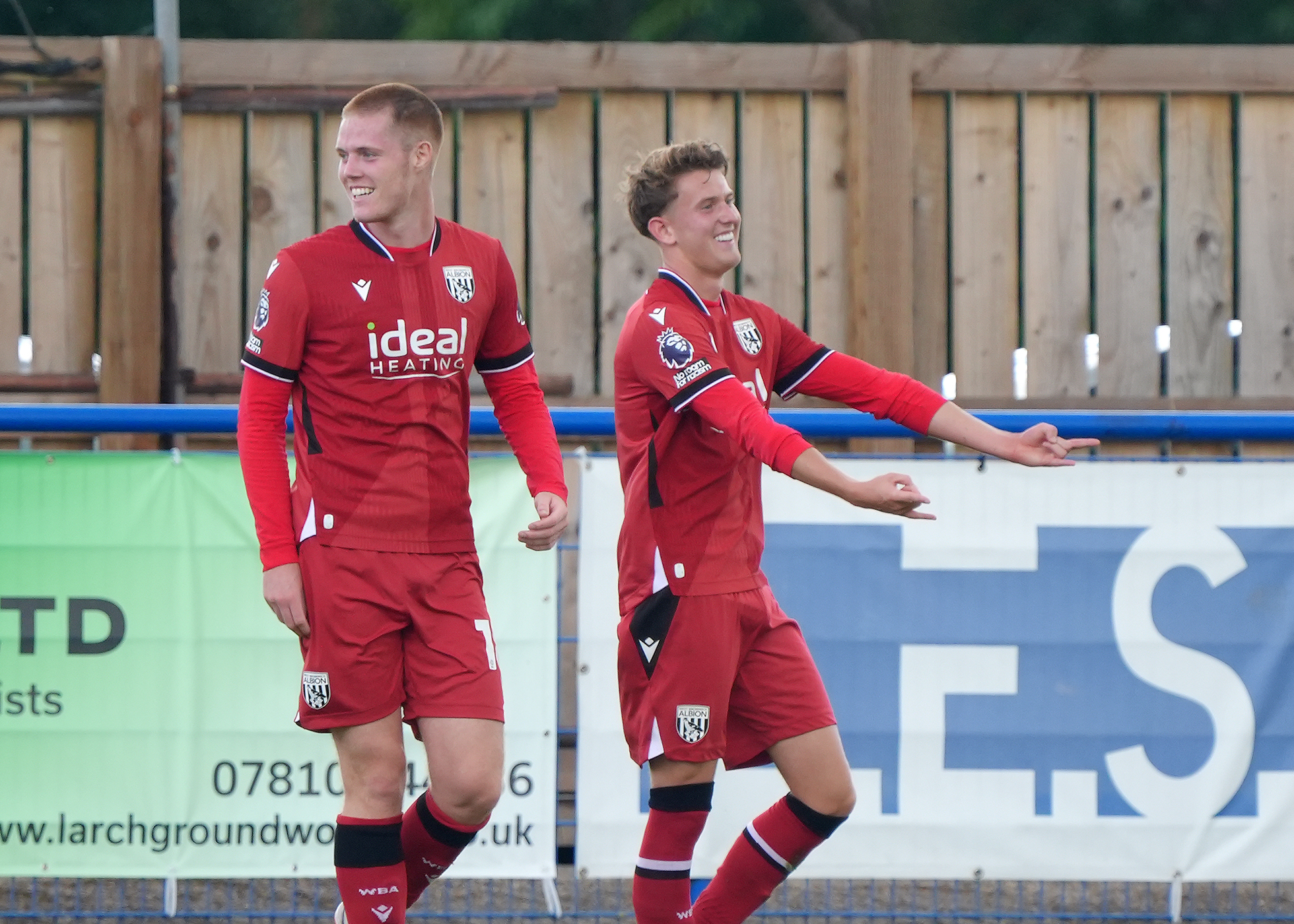 Jack Bray celebrates scoring against Derby PL2 in the red away kit 