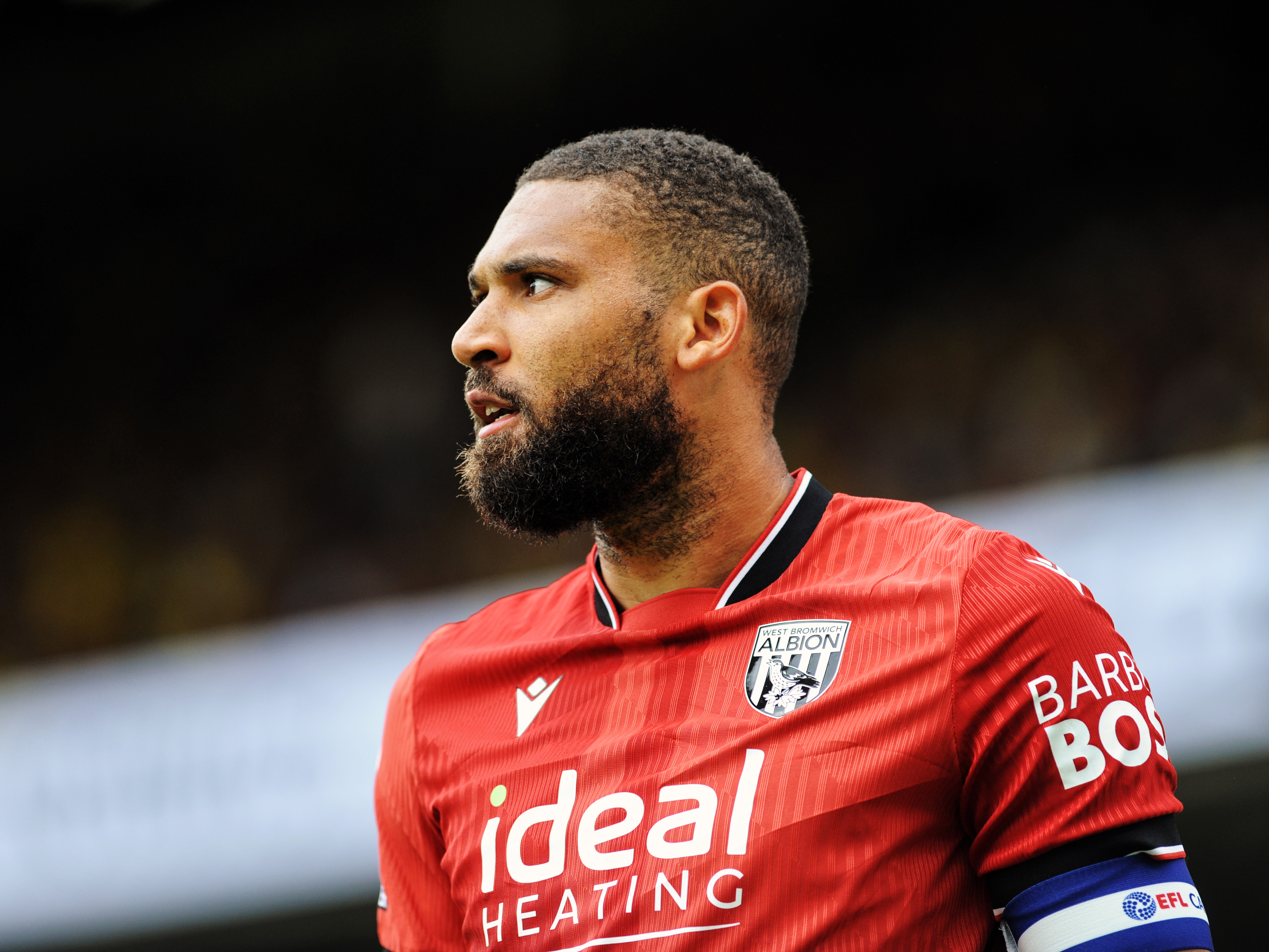 A close-up of George Campbell during the game at Norwich in the red away kit 