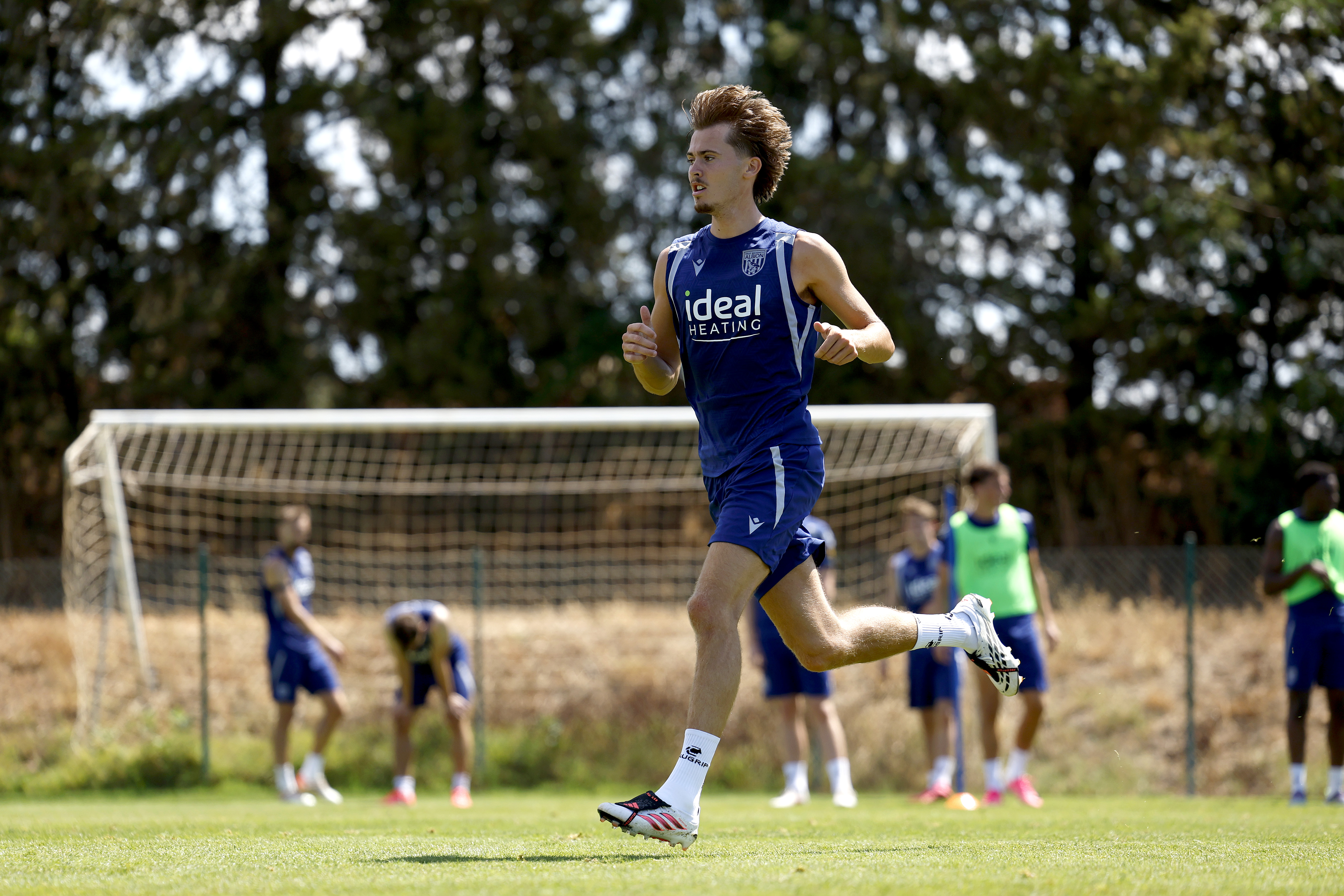 Isaac Price running during a training session