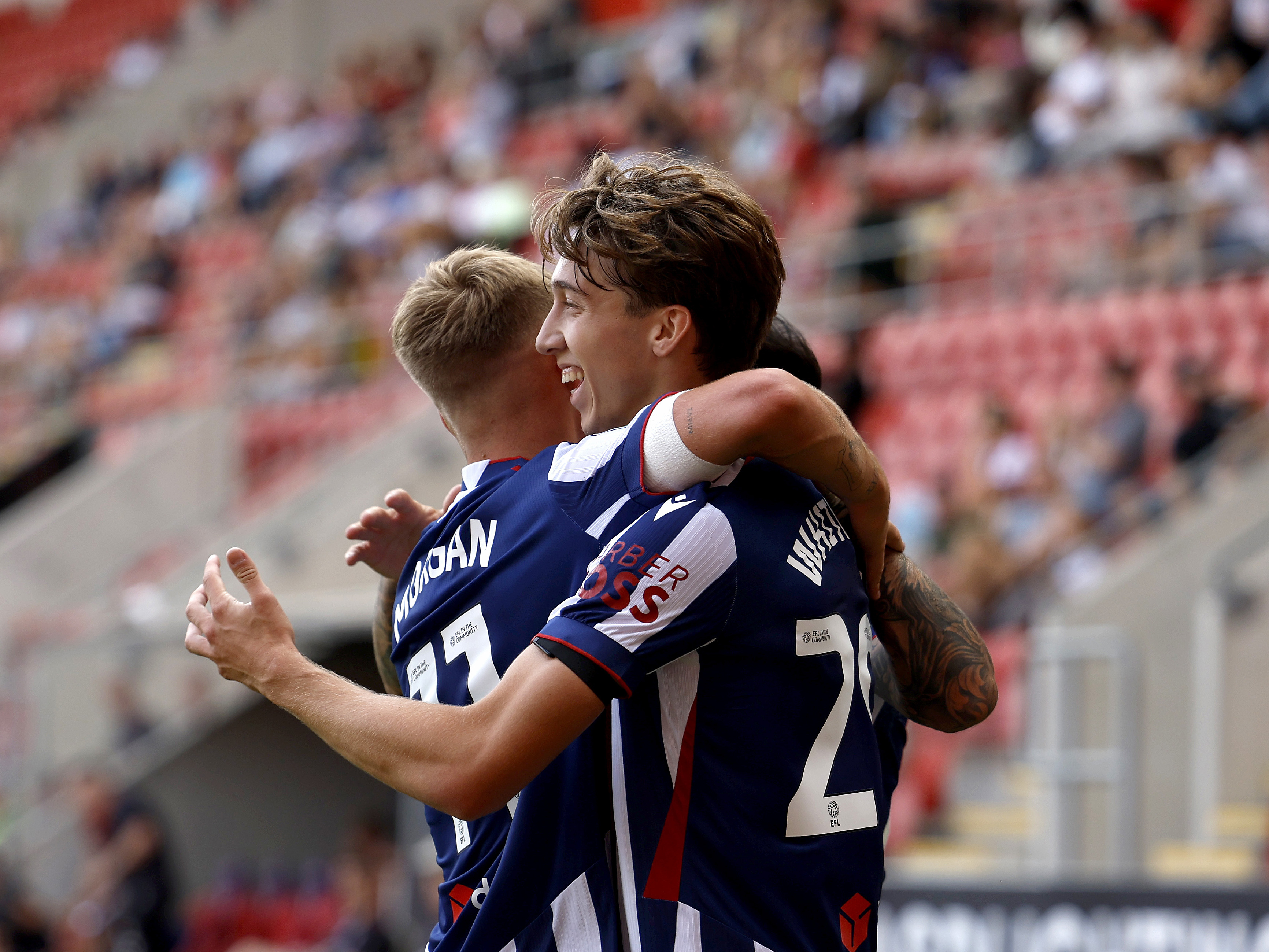 An image of Harry Whitwell and JJ Morgan celebrating a goal against Rotherham
