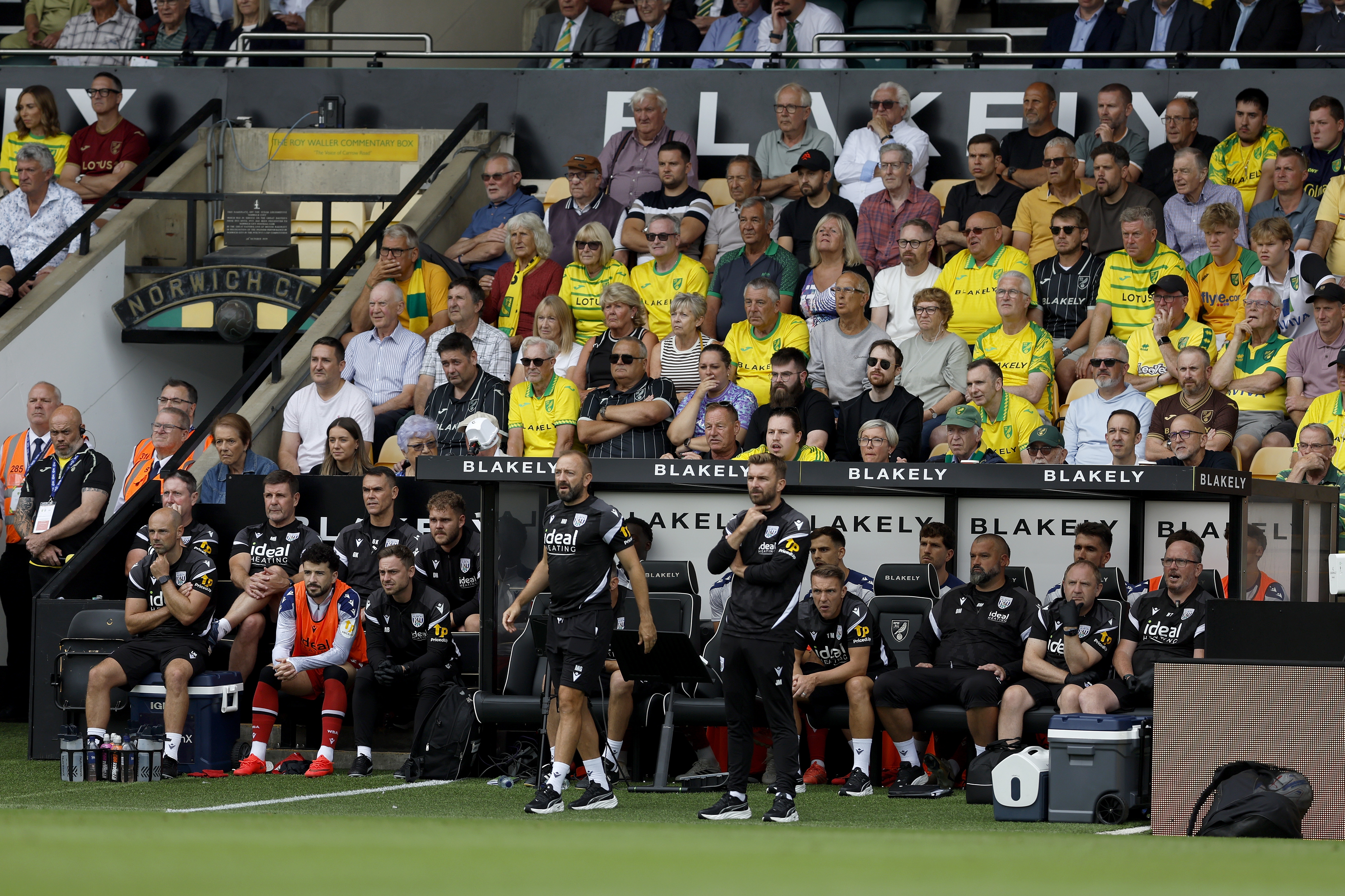 James Morrison watches on from the touchline at Carrow Road