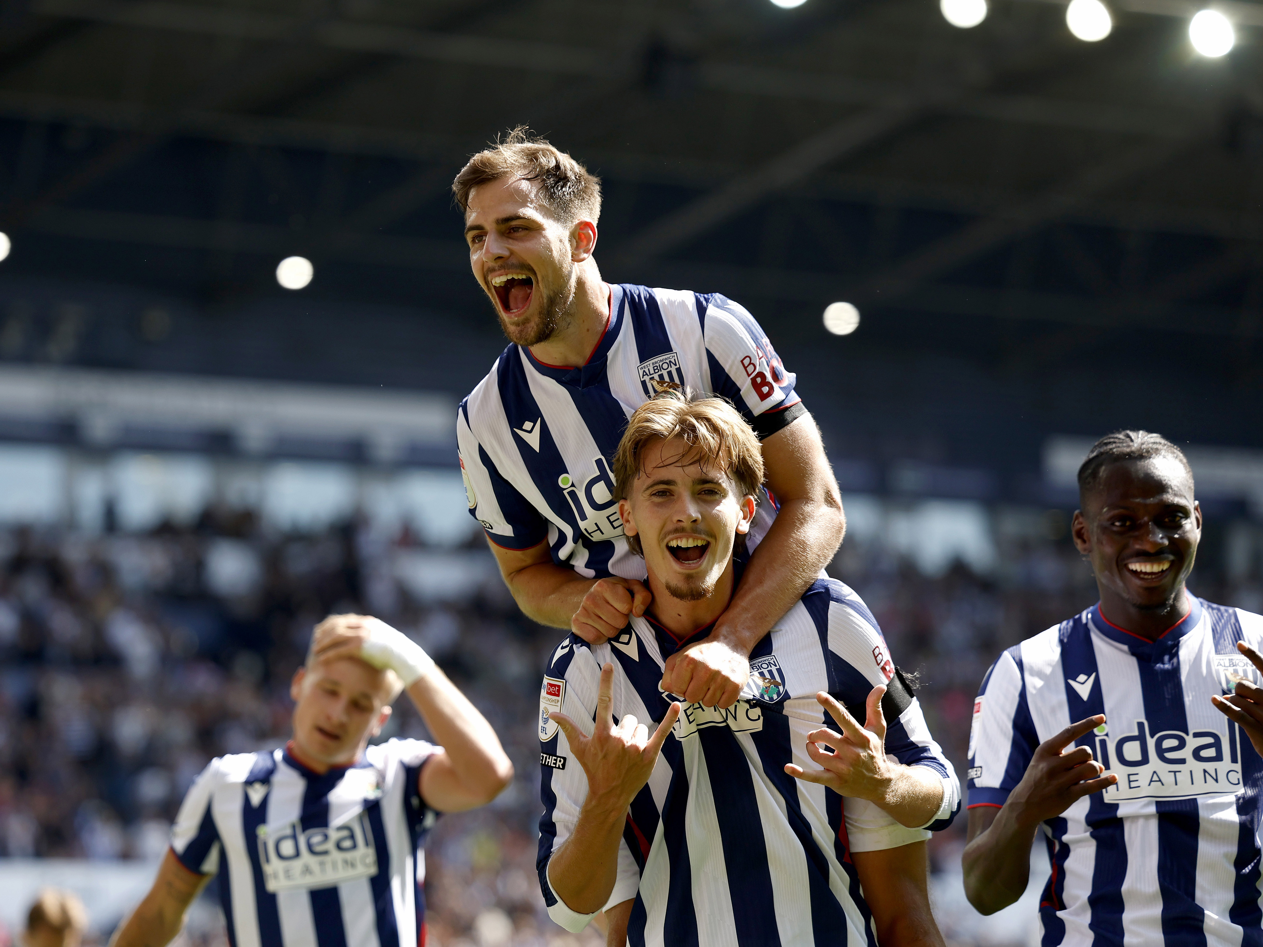 An image of Isaac Price celebrating his goal against Wrexham
