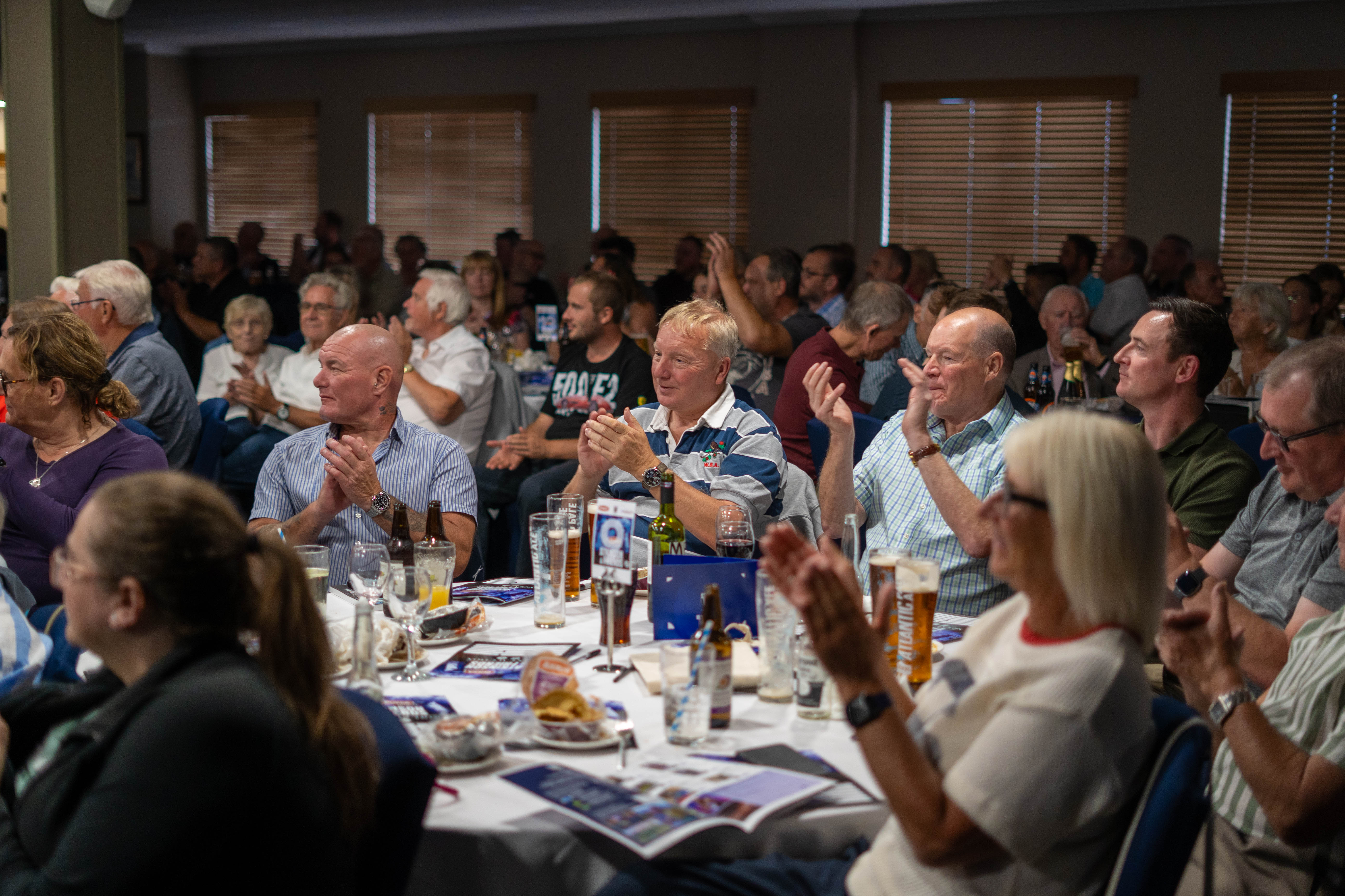 Guests applaud during the Pukka Night with Ron Atkinson and Friends at The Hawthorns.