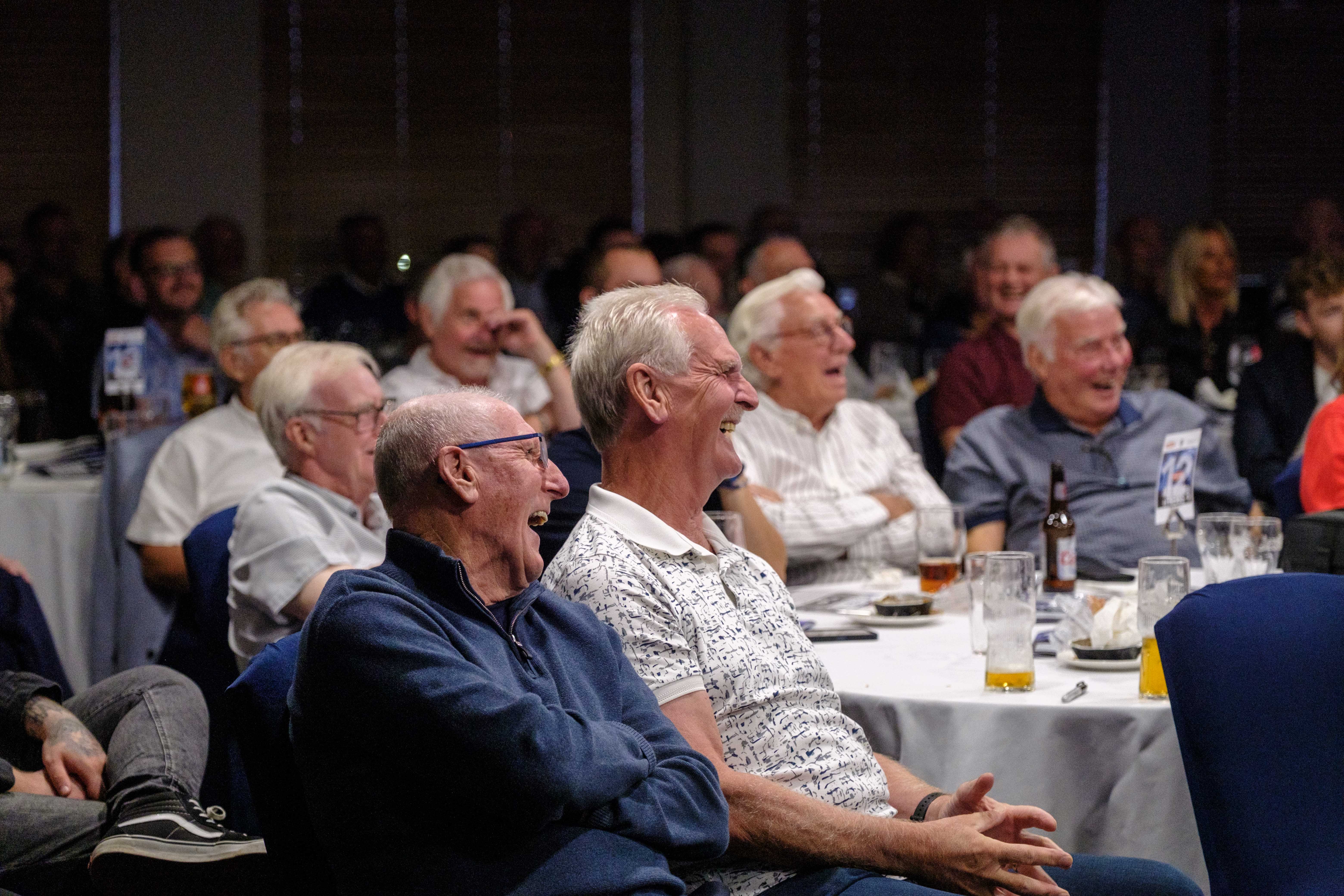 Ally Robertson and Tony Brown share a laugh with guests during Pukka Night with Ron Atkinson and Friends.