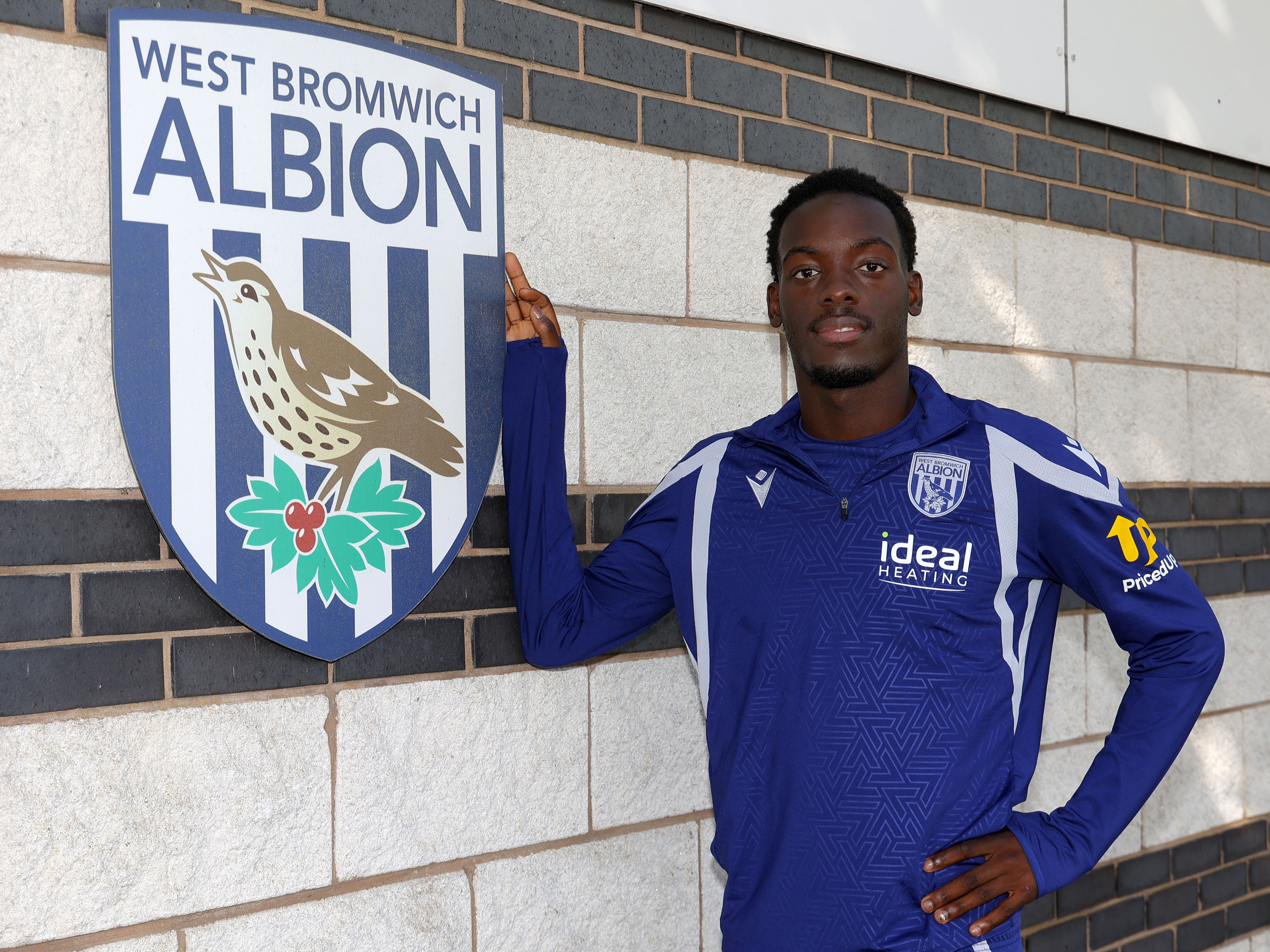 An image of Rabby Nzingoula next to an Albion badge