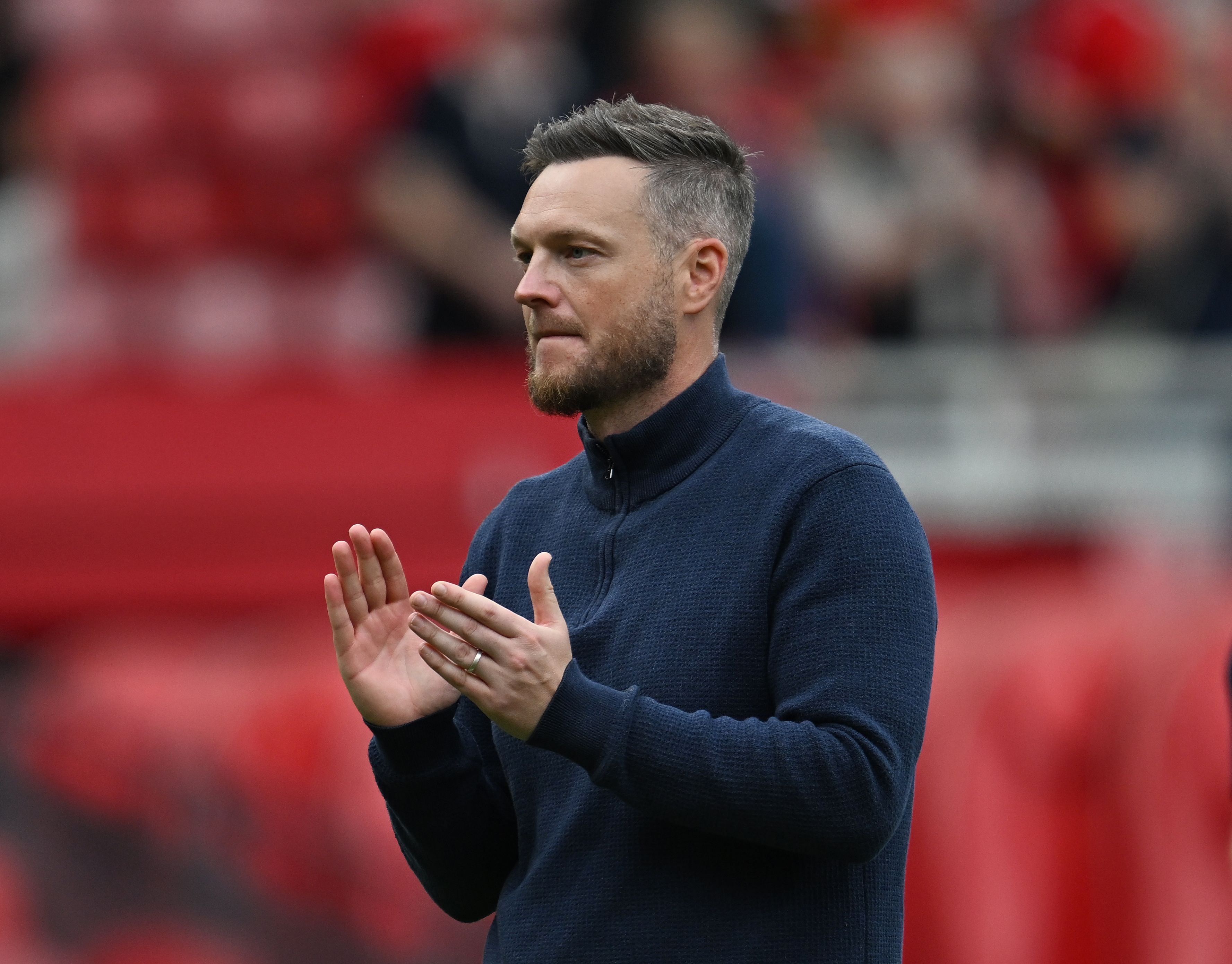 Kim Hellberg applauds the fans at the Riverside.