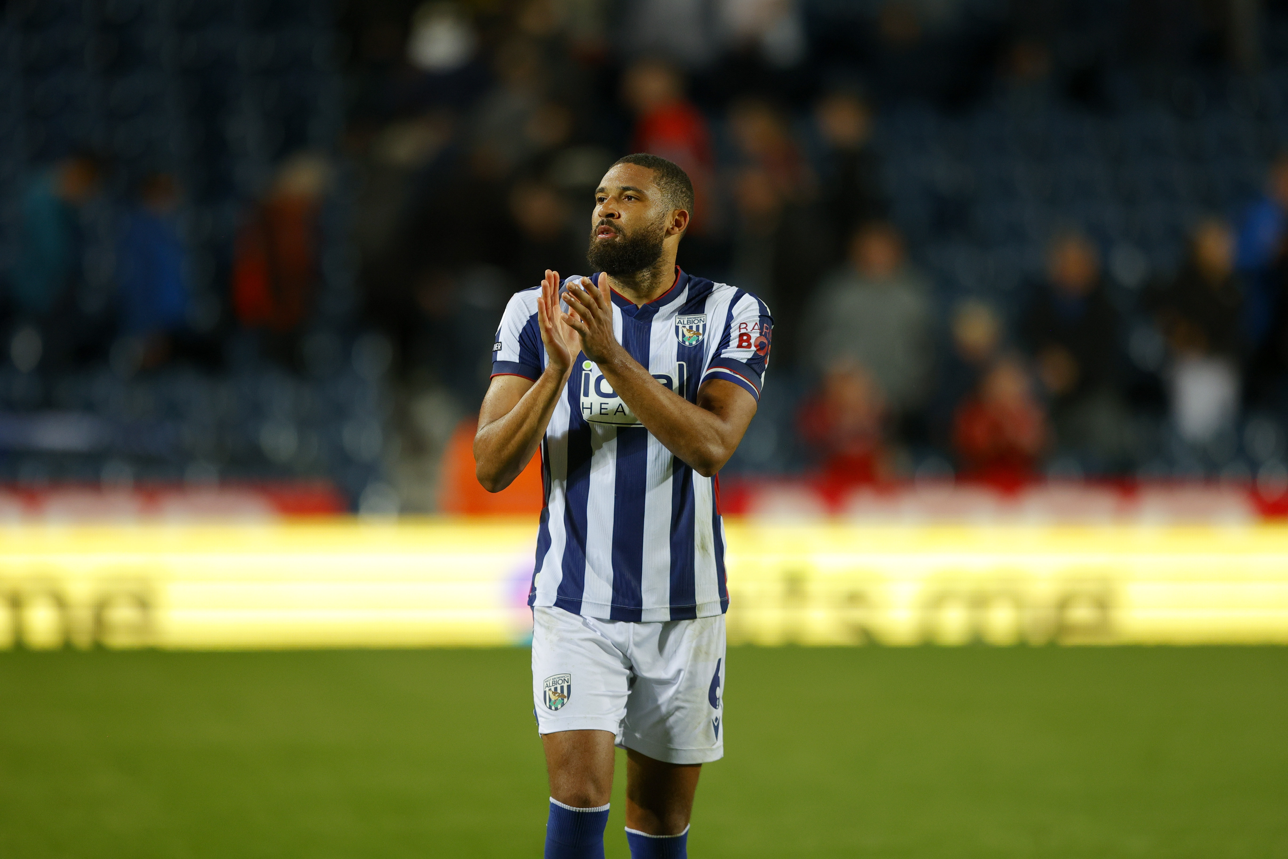 George Campbell claps WBA fans after the draw with Charlton in the home kit 