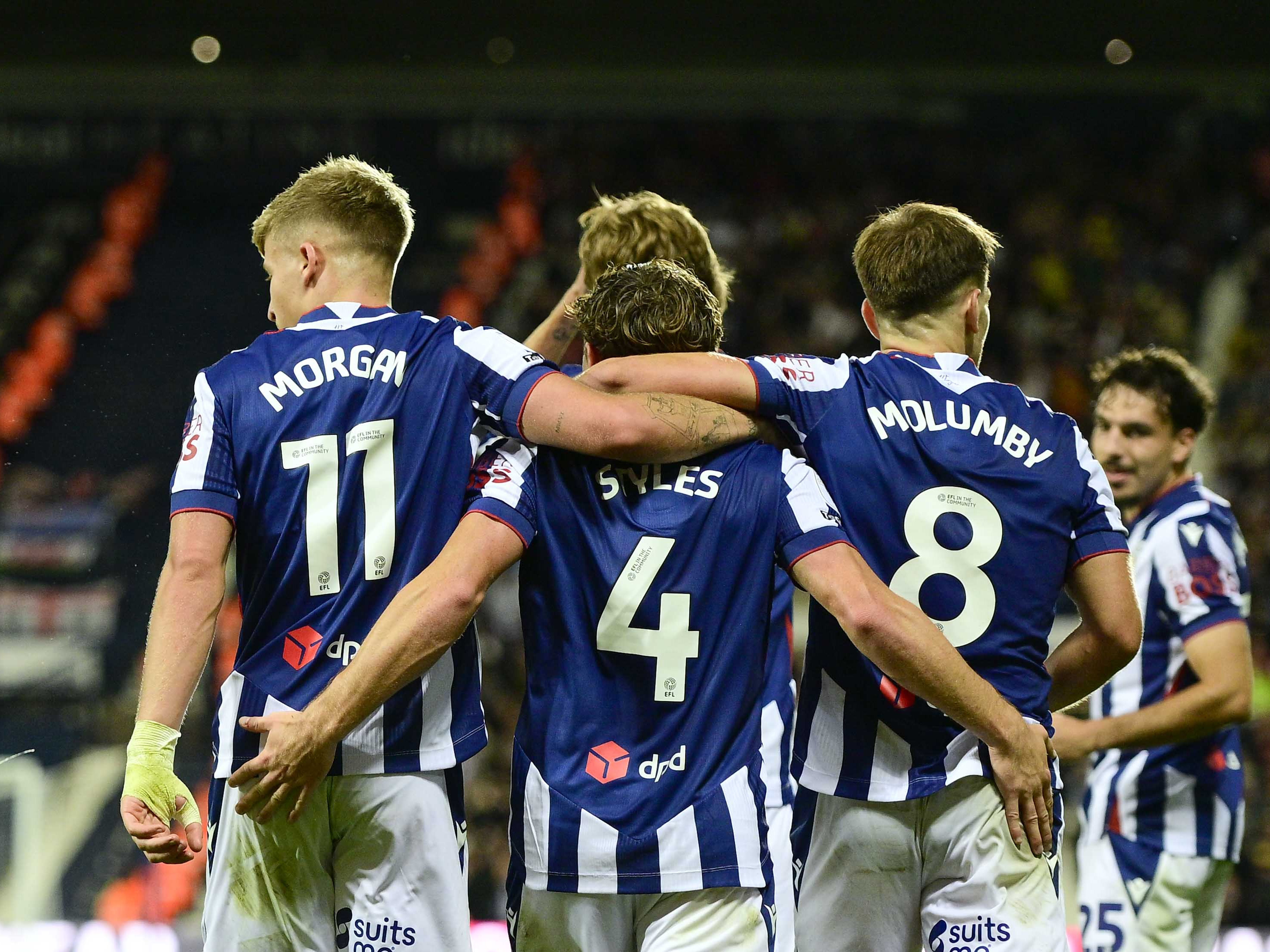 Callum Styles celebrates with team-mates after scoring against Charlton