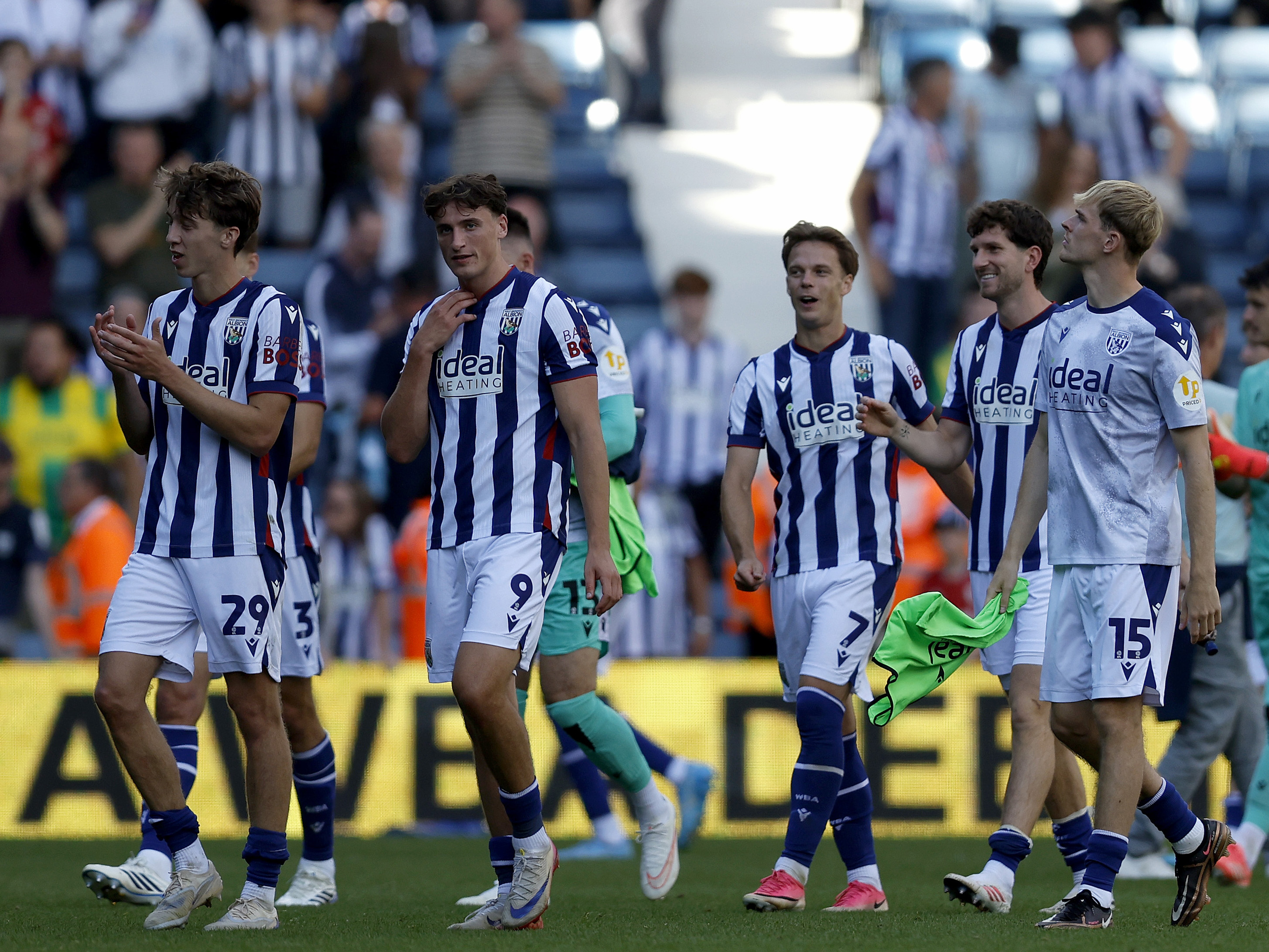 WBA players walk off the pitch after beating Watford 