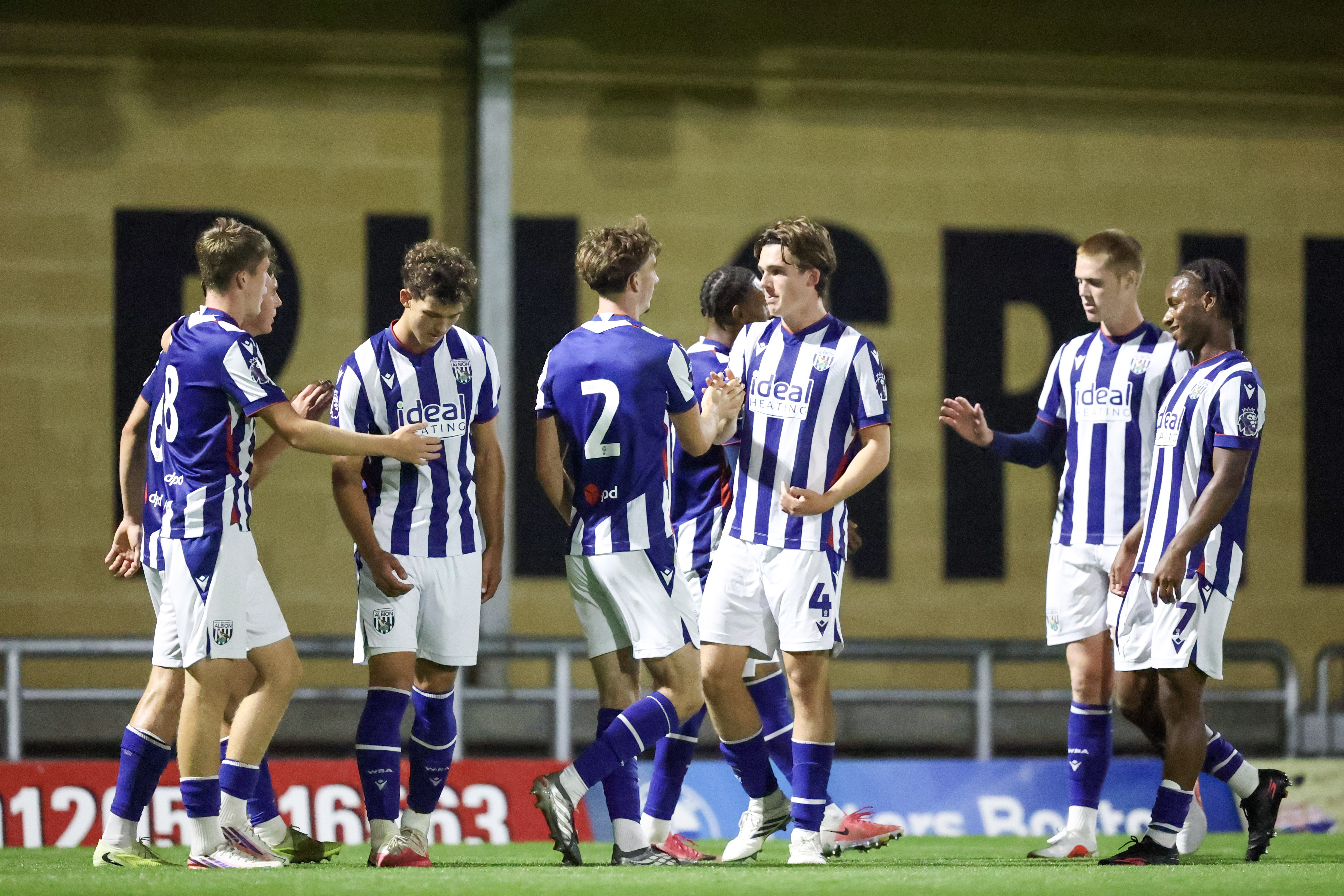 Albion players celebrate.
