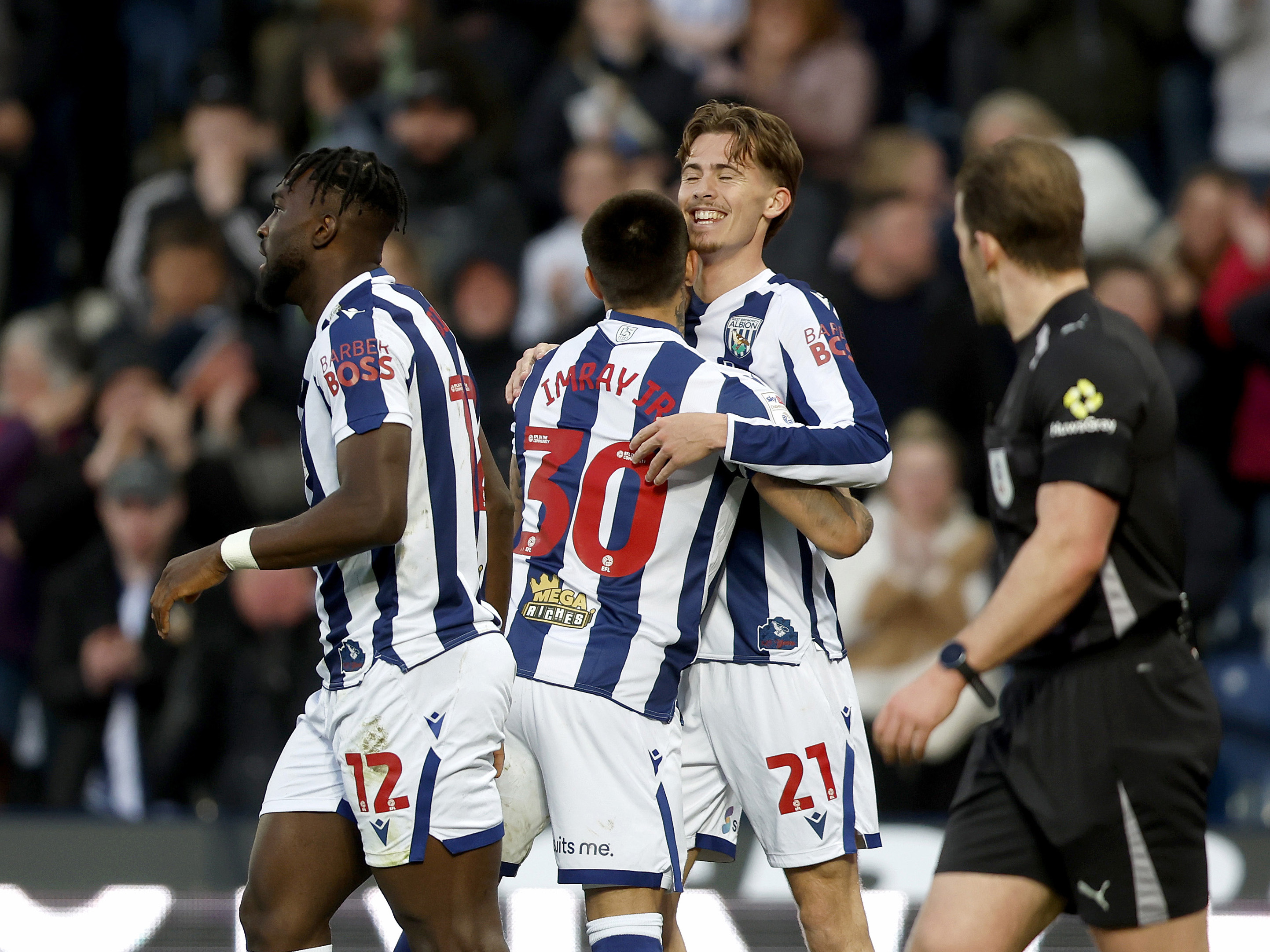 Isaac Price celebrates with Danny Imray after scoring against Watford in April 2026