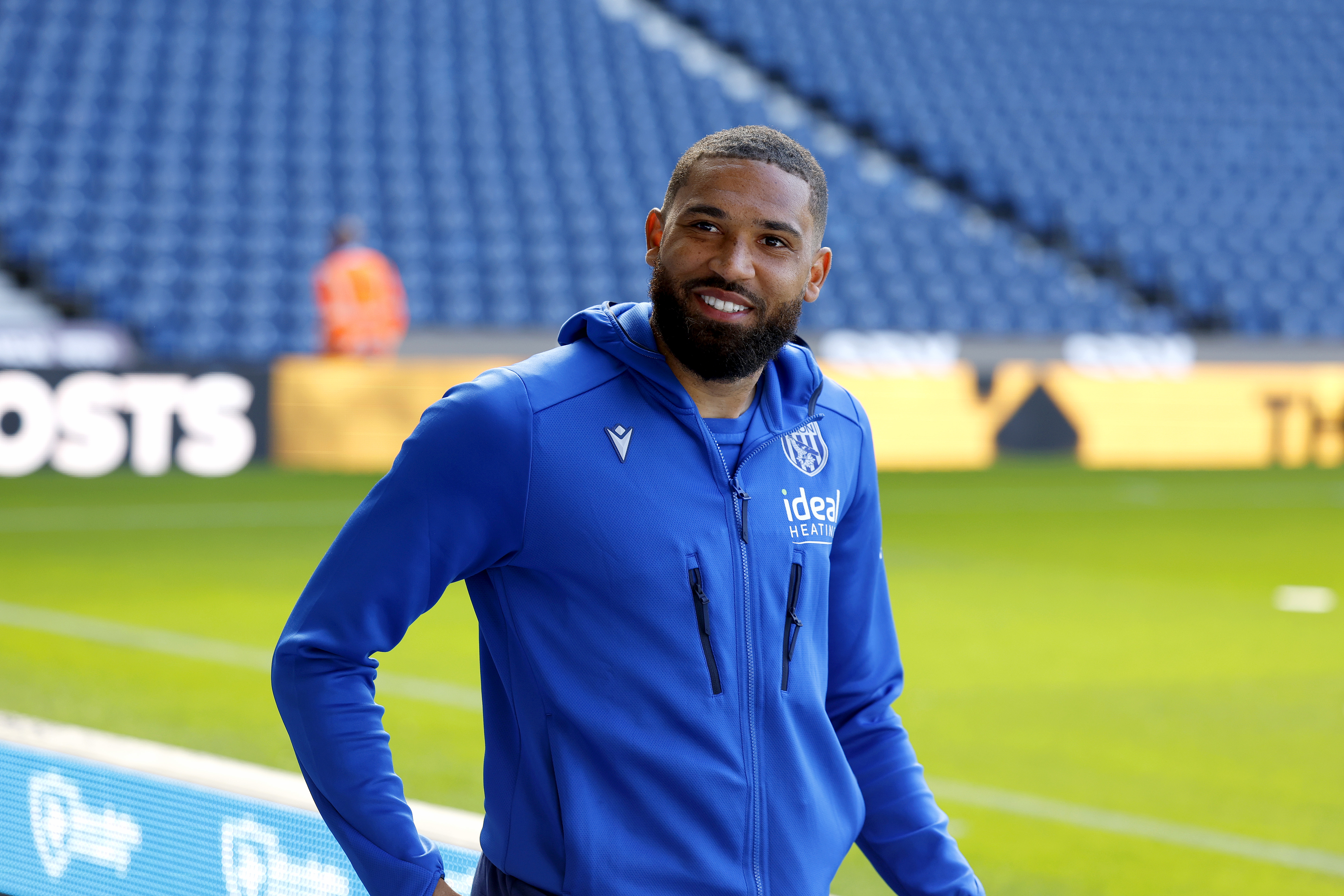 George Campbell smiles on arrival for a matchday