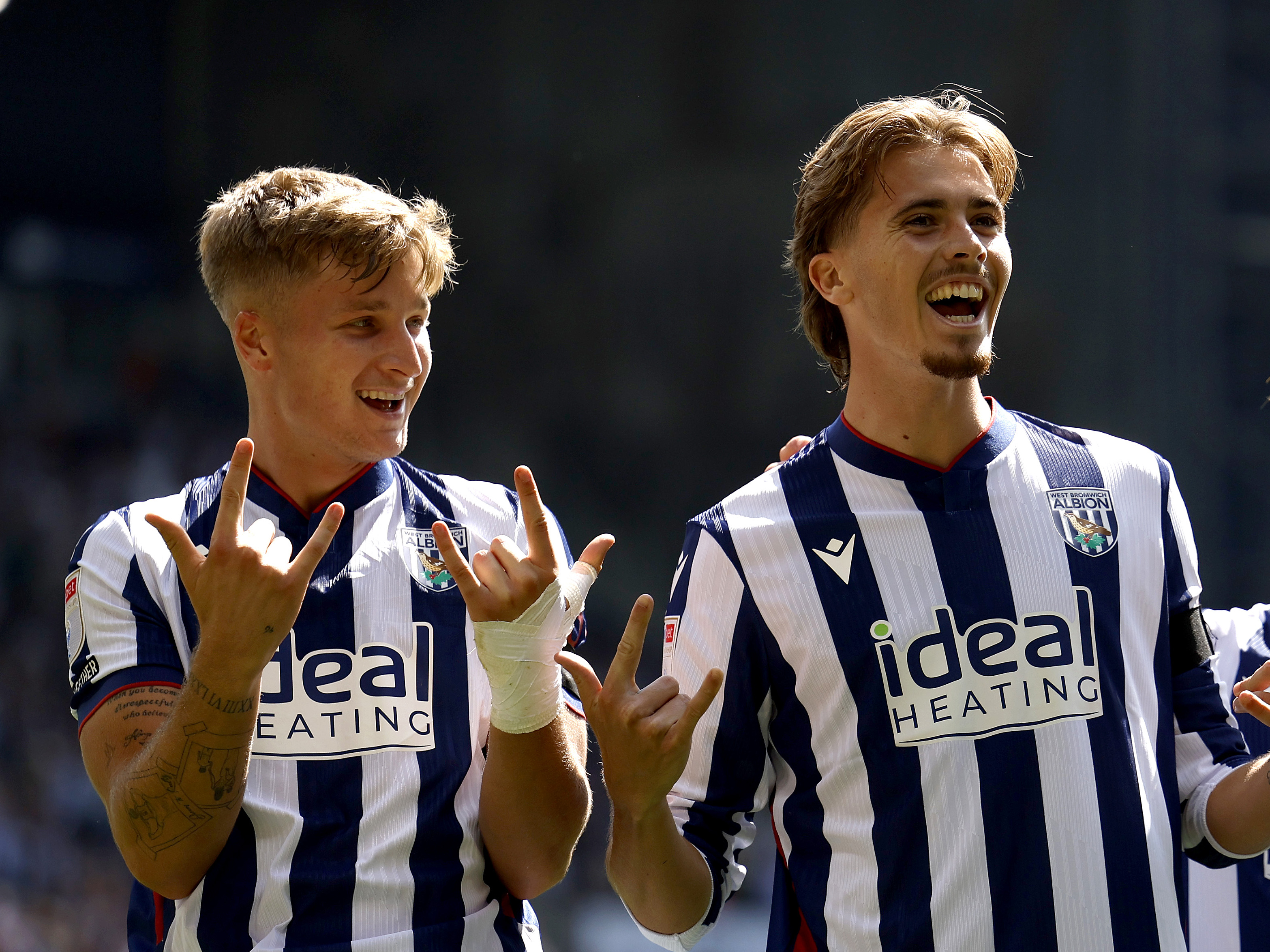 JJ Morgan and Isaac Price celebrate a goal in the home kit 