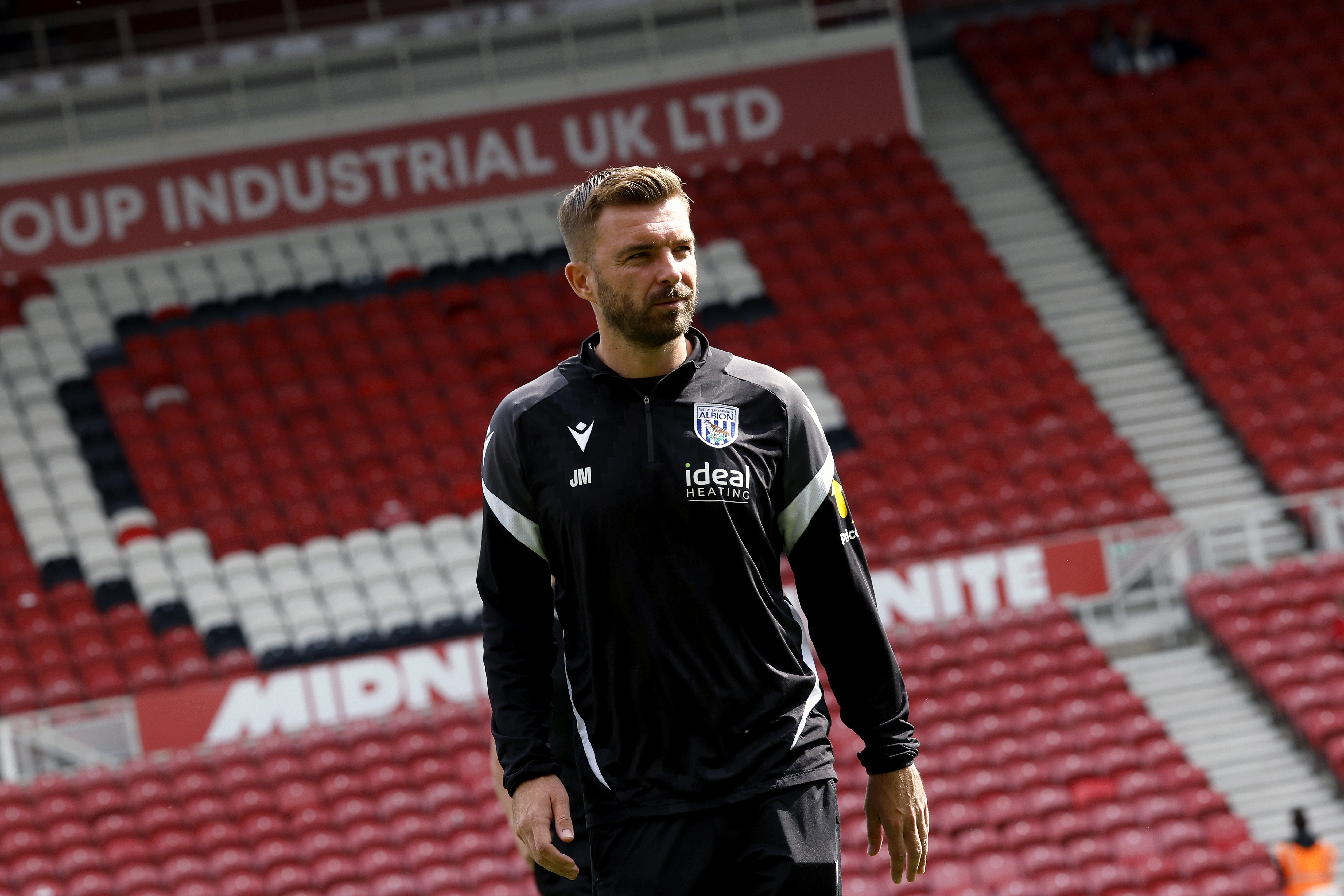 James Morrison in a black WBA tracksuit at Middlesbrough