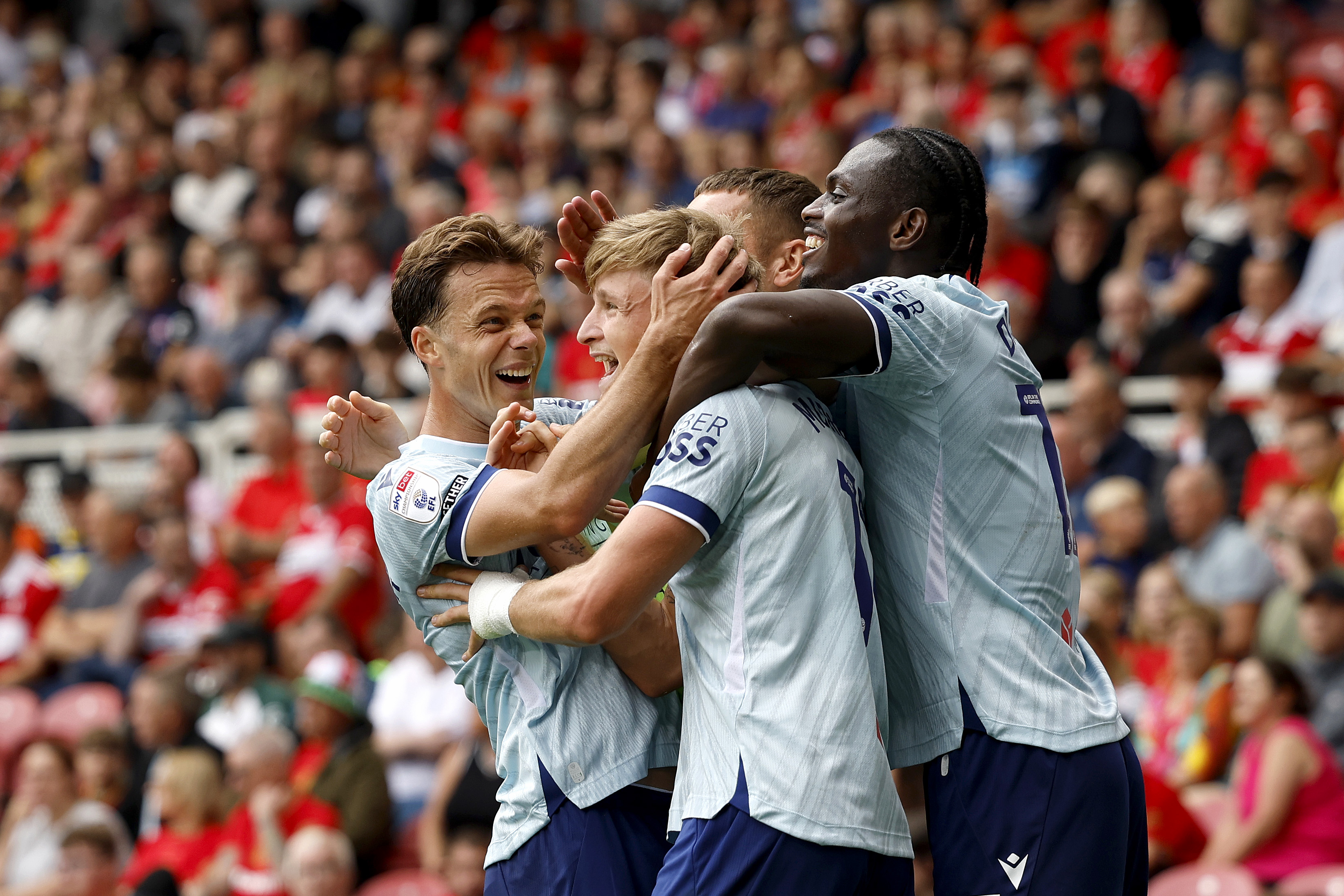 JJ Morgan celebrates with his team-mates after scoring against Middlesbrough 