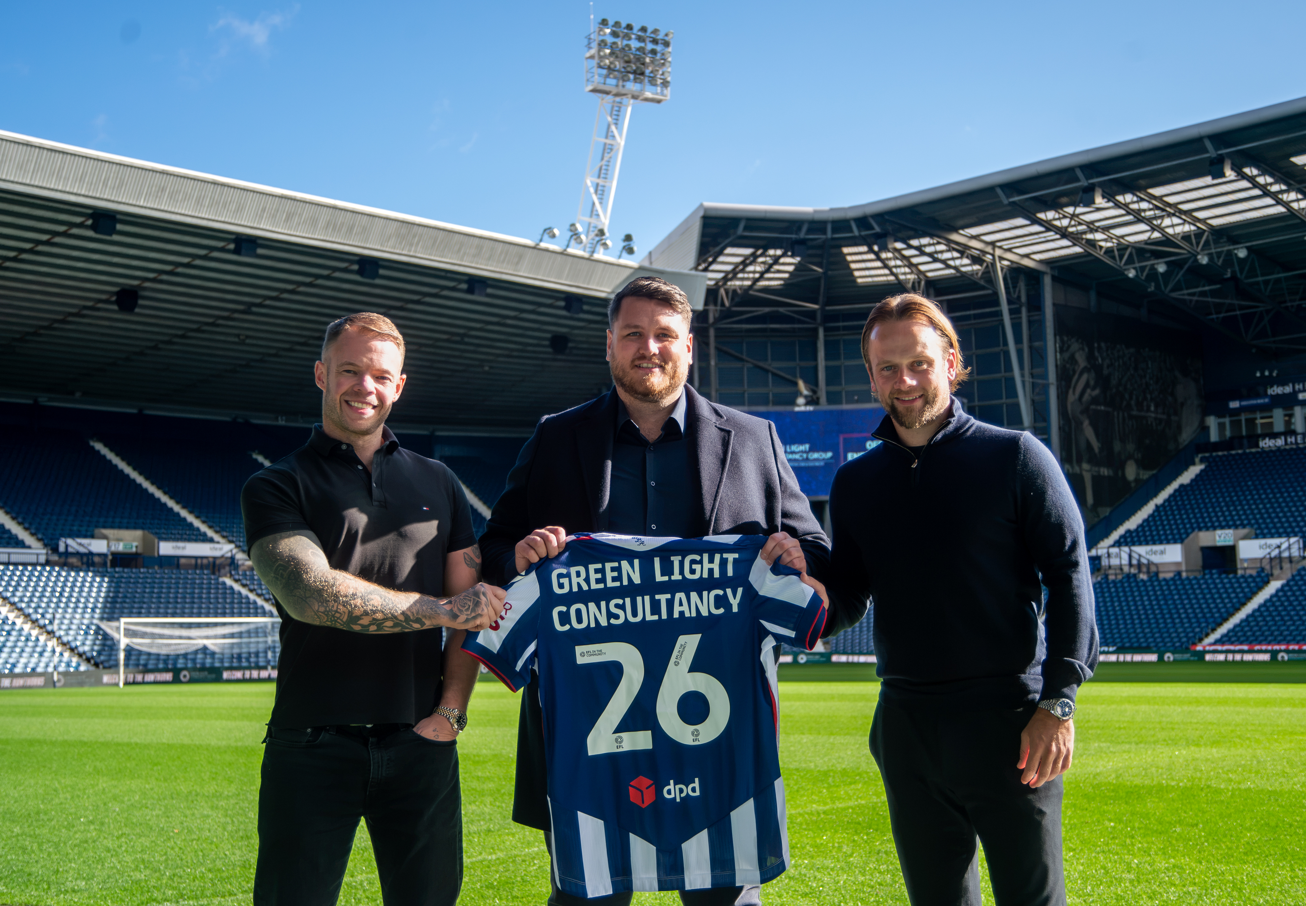 Green Light Consultancy presented with Albion shirt. 