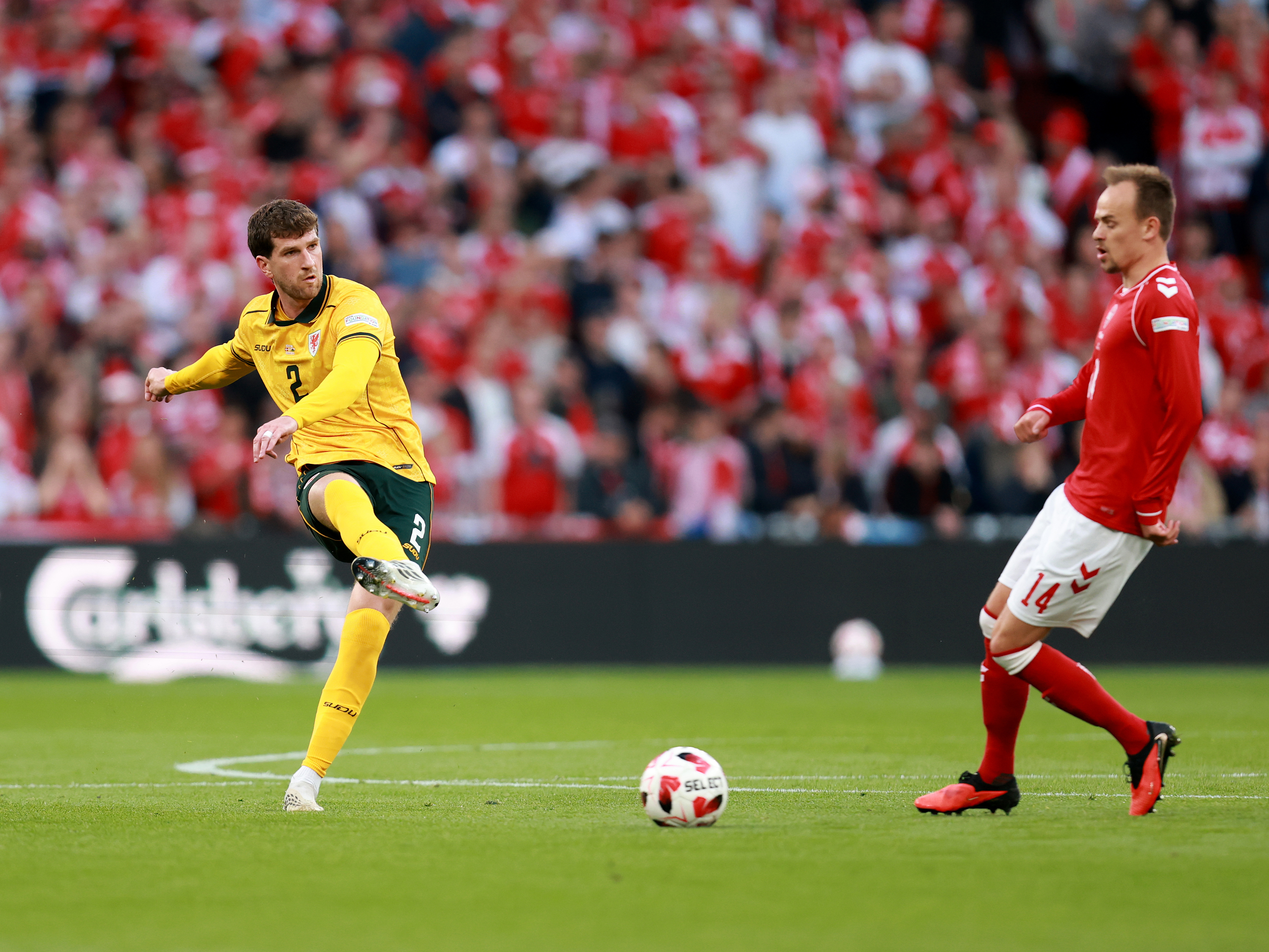 A photo of Albion defender Chris Mepham playing for international side Wales