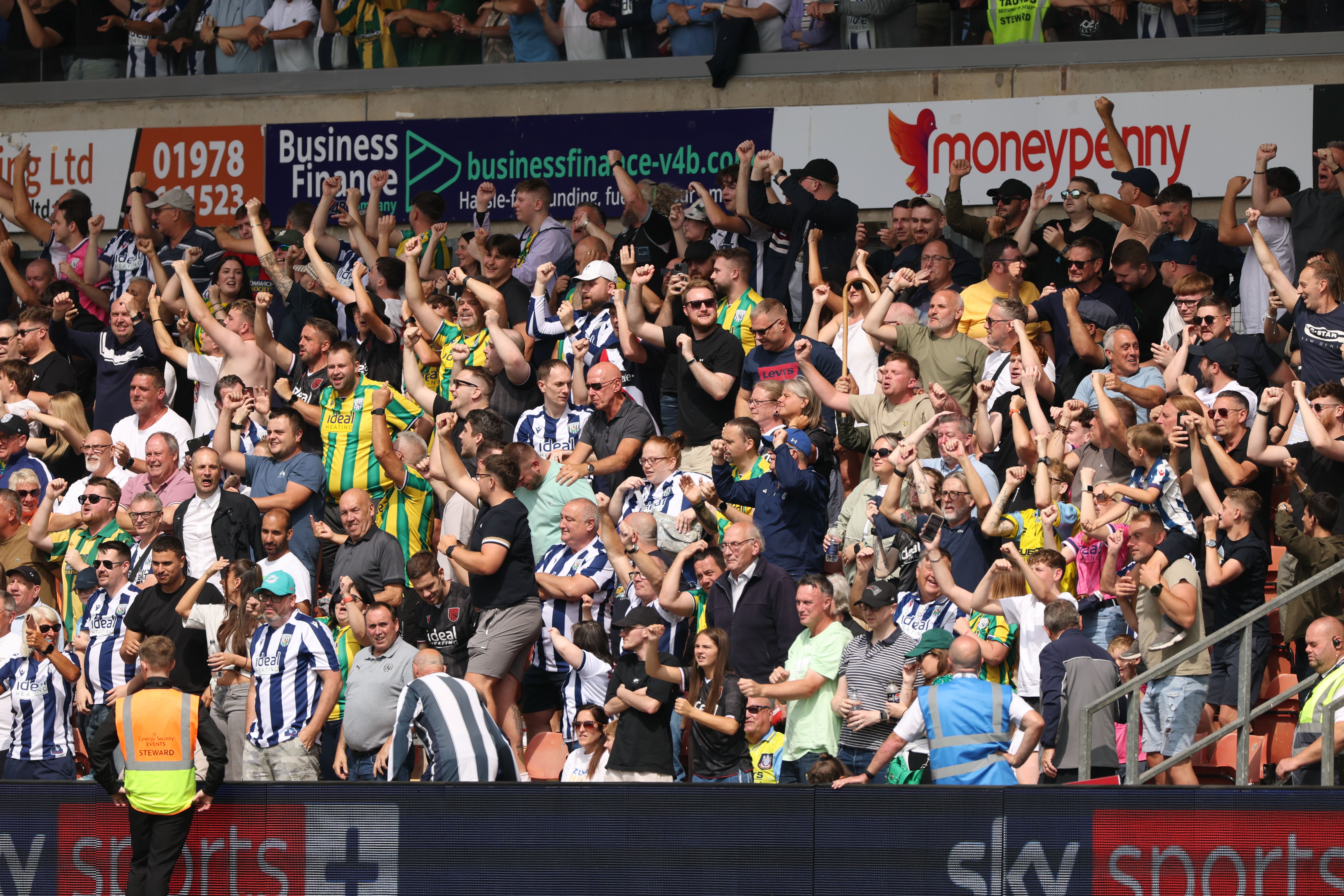 WBA fans cheering at Wrexham
