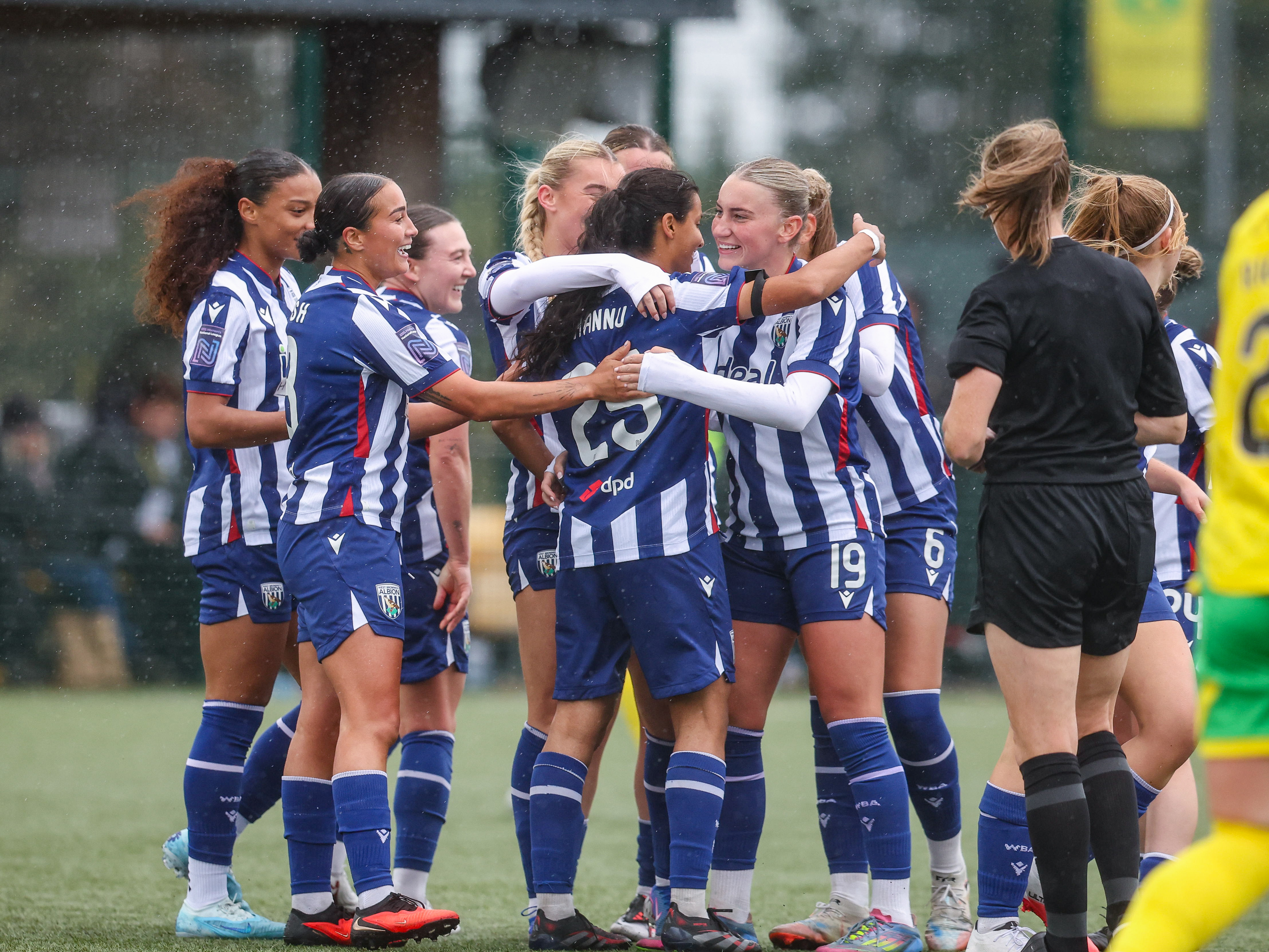 Albion Women celebrate their second against Norwich City.