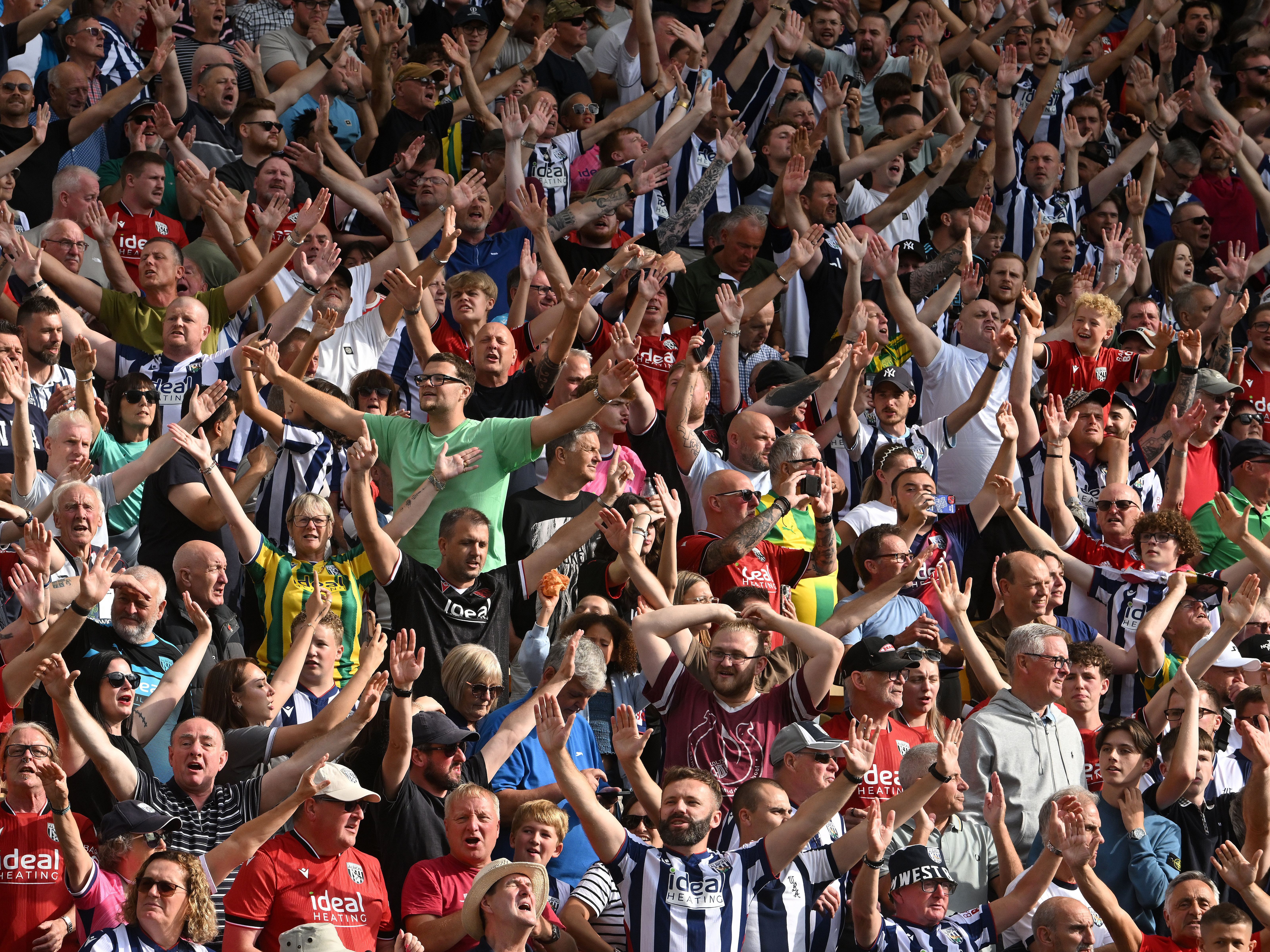 WBA fans cheering in the stand at a game 