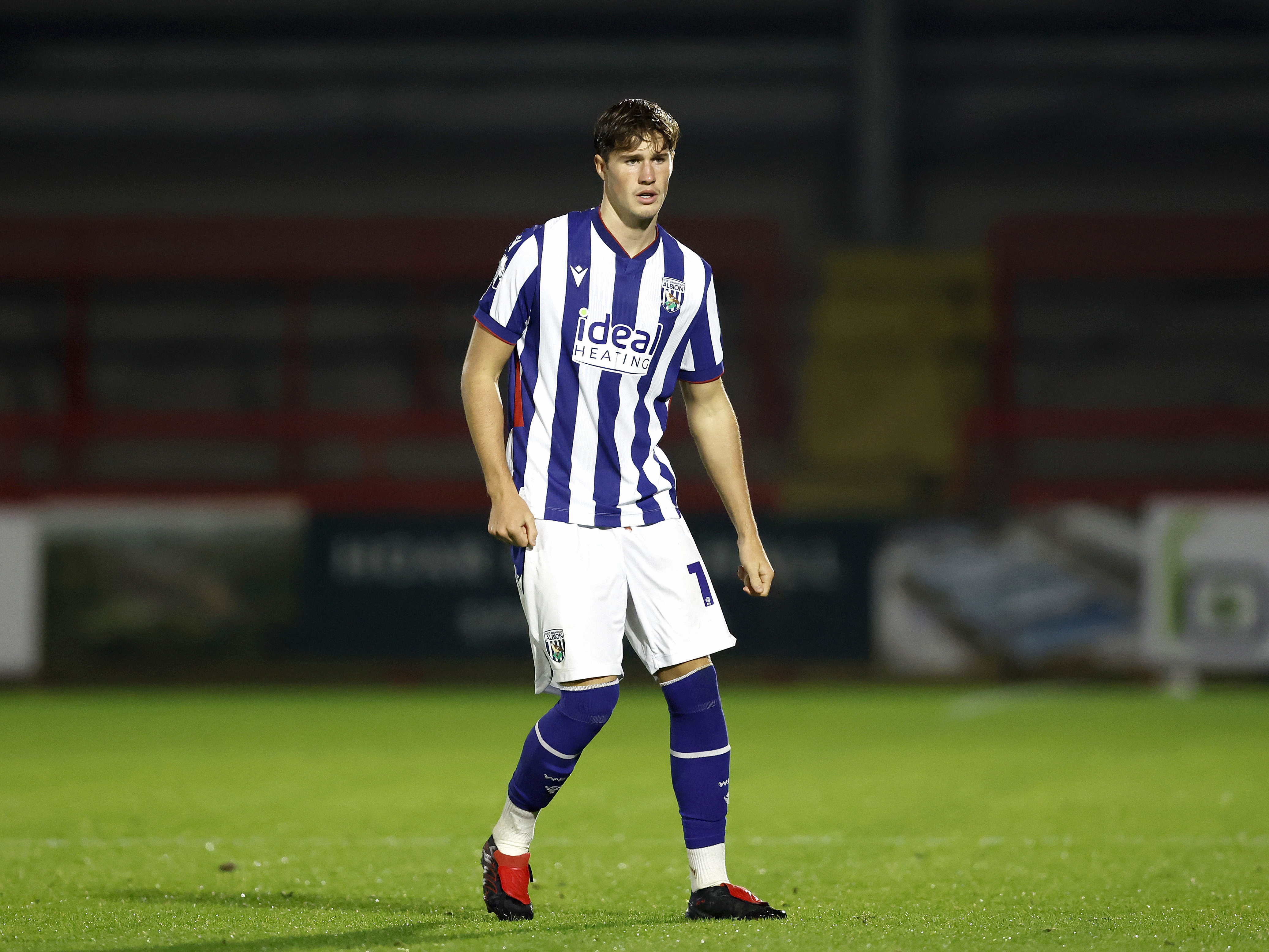A photo of young Albion defender George Shaw in the 2026/27 home kit