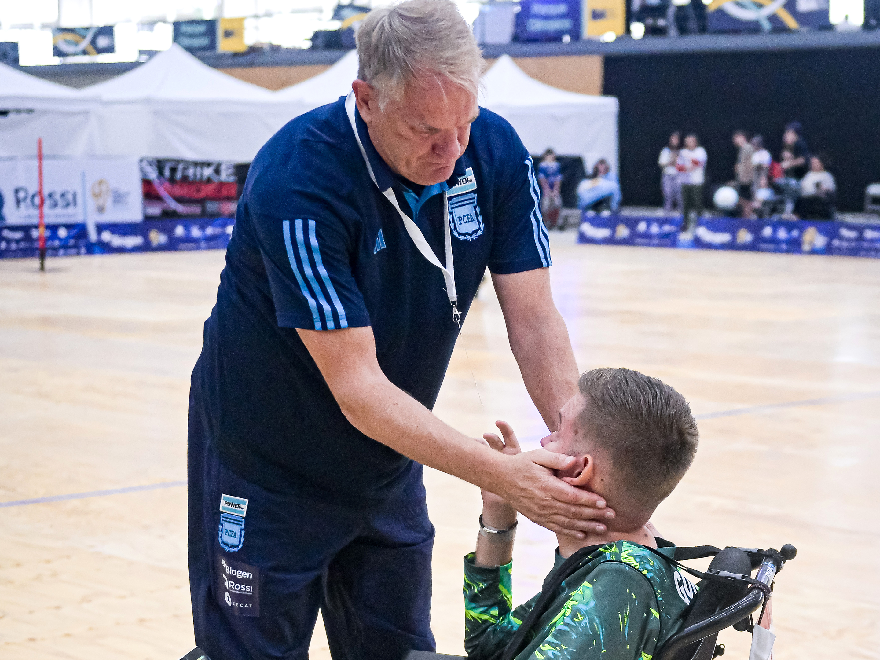 Colin embracing Chris after the semi-final.
