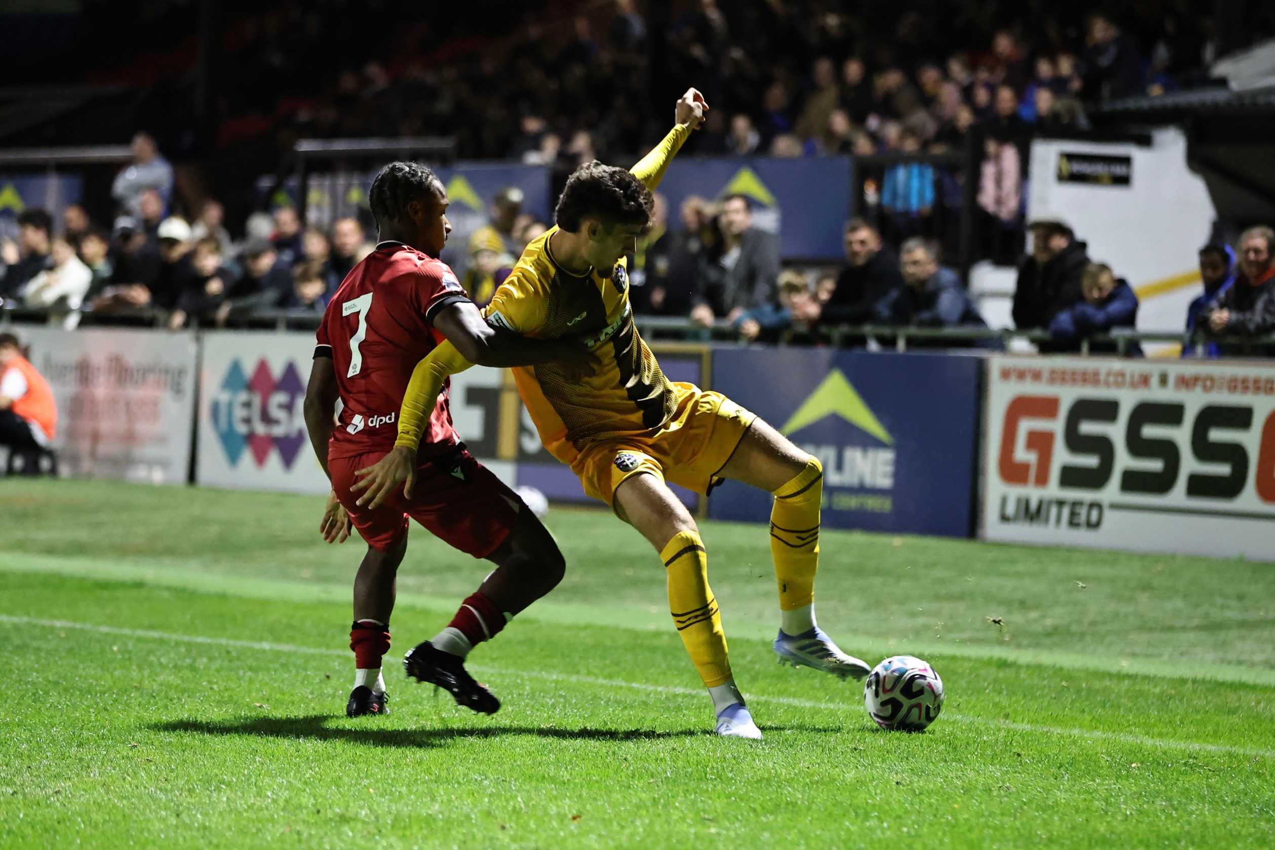Remar McNeil in action against Sutton United.