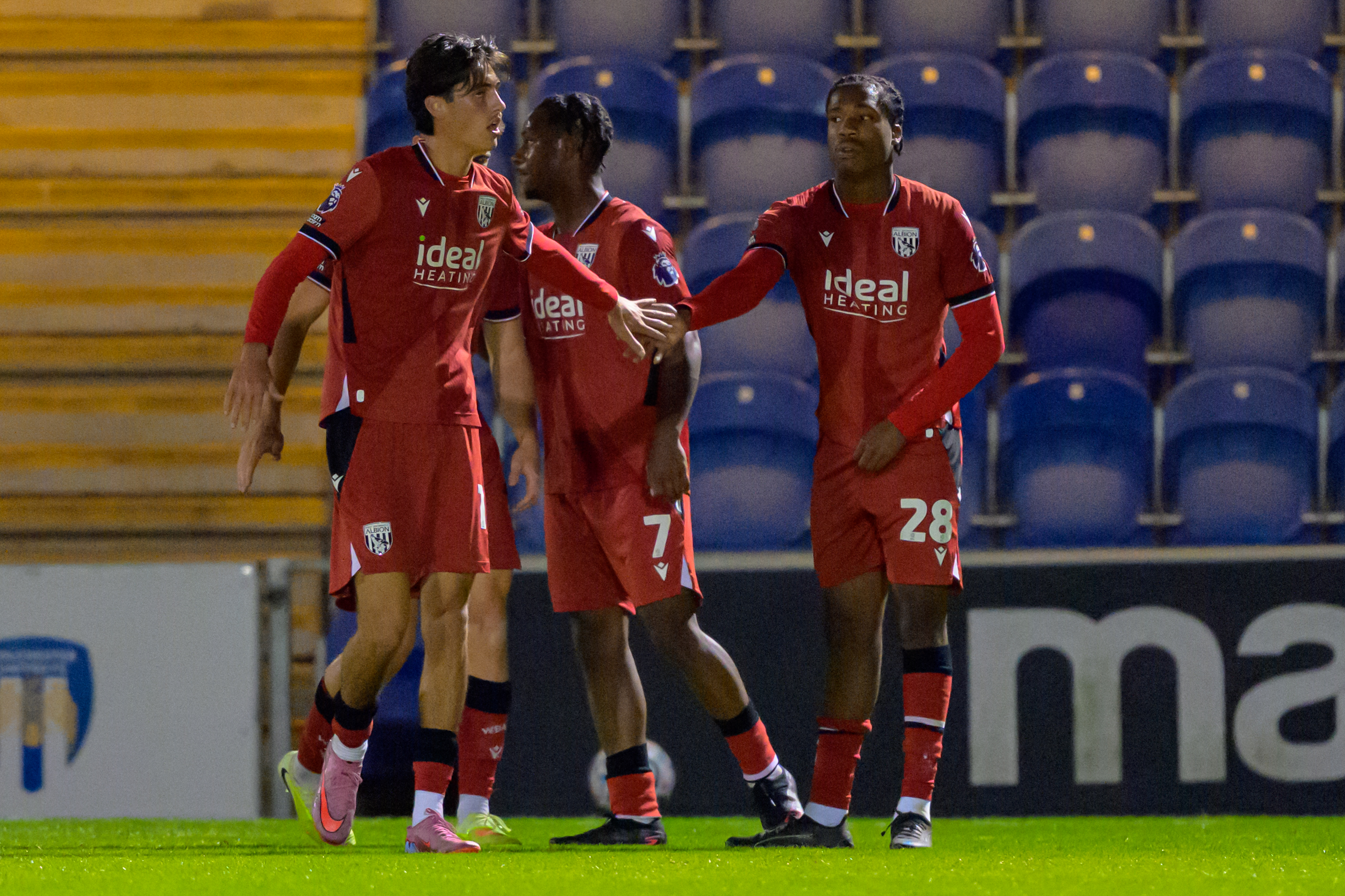 Albion's PL2 players celebrate a goal scored at Ipswich 