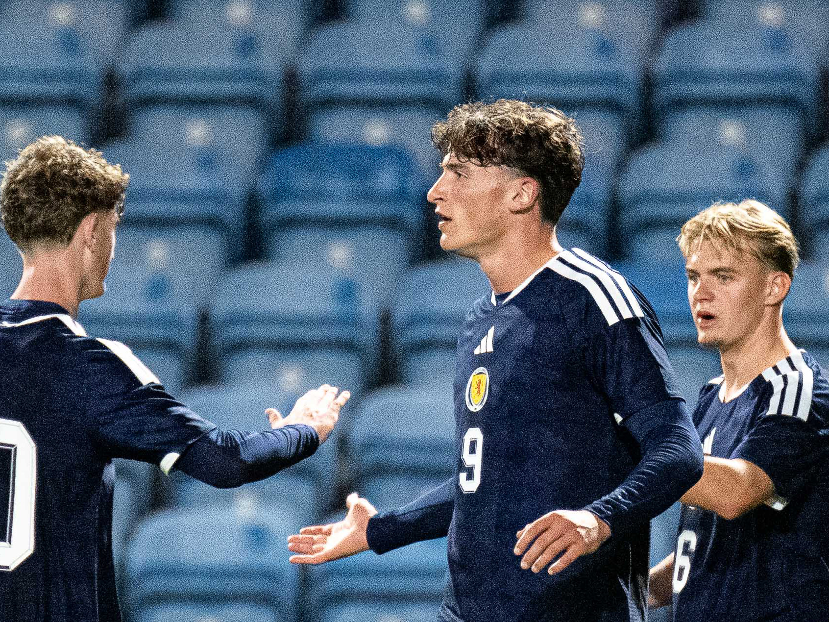 Barney Stewart celebrates scoring a goal for Scotland's U21 side