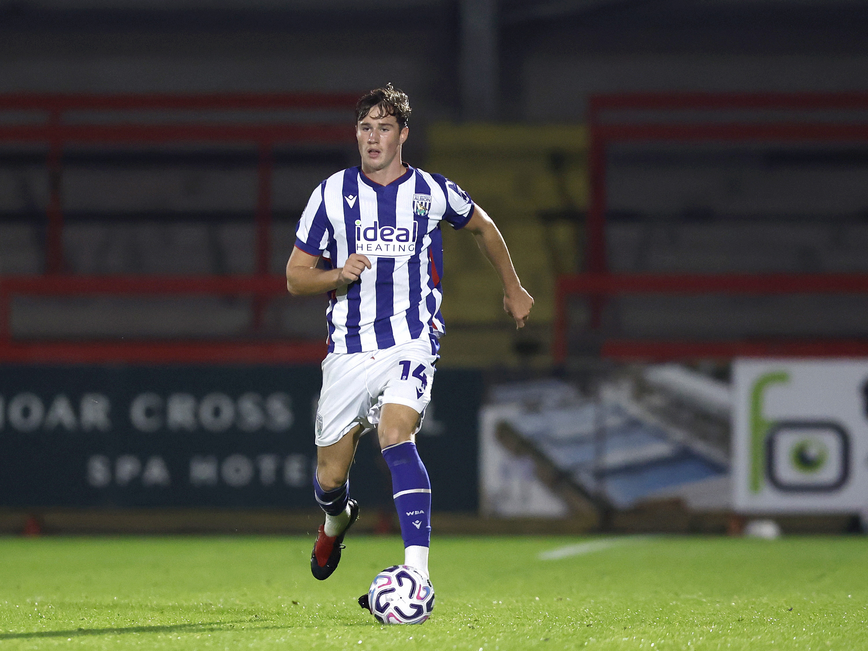 A photo of young Albion defender George Shaw in the 2026/27 home kit