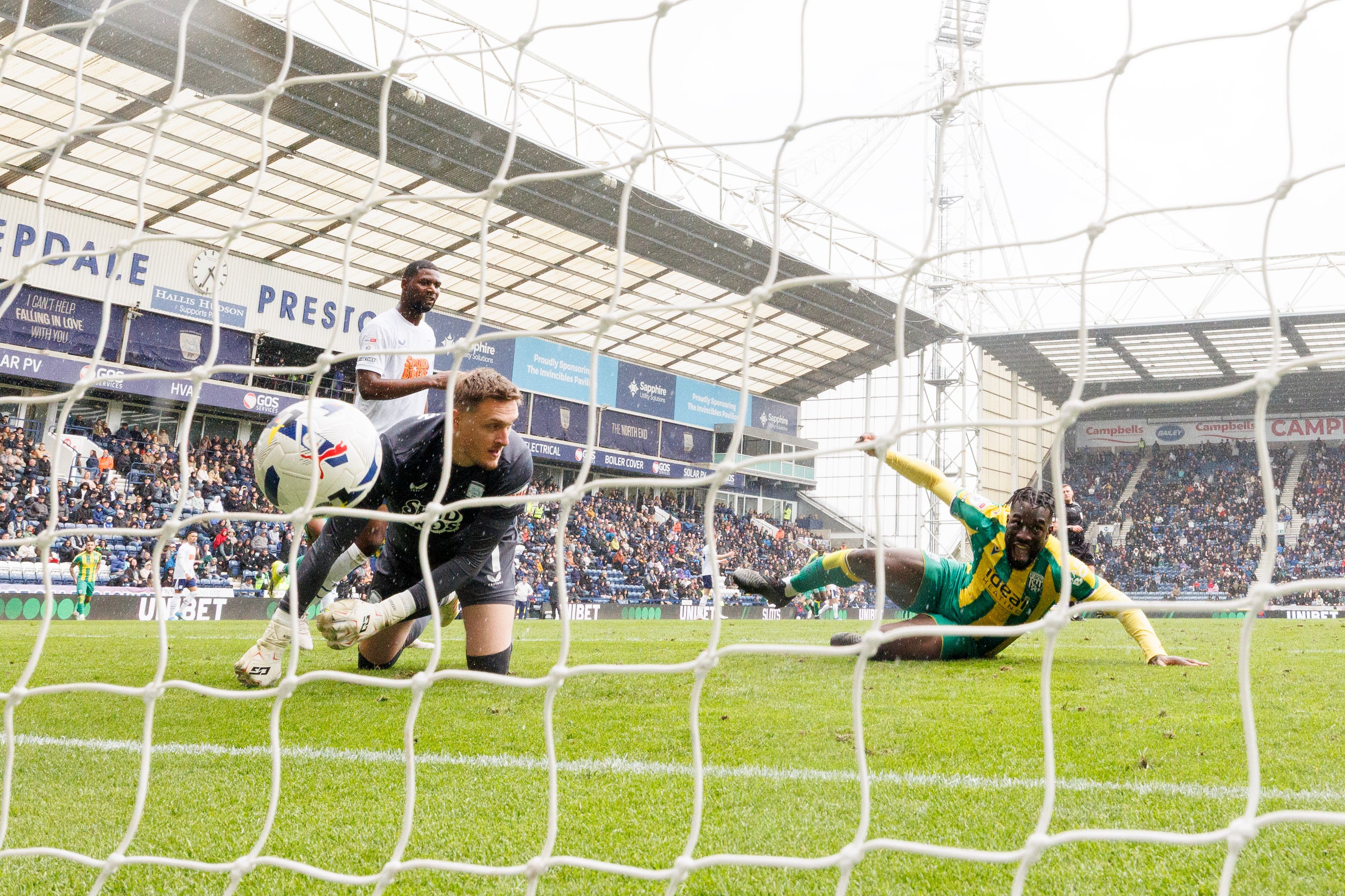 A shot from behind the net of Daryl Dike scoring at Preston