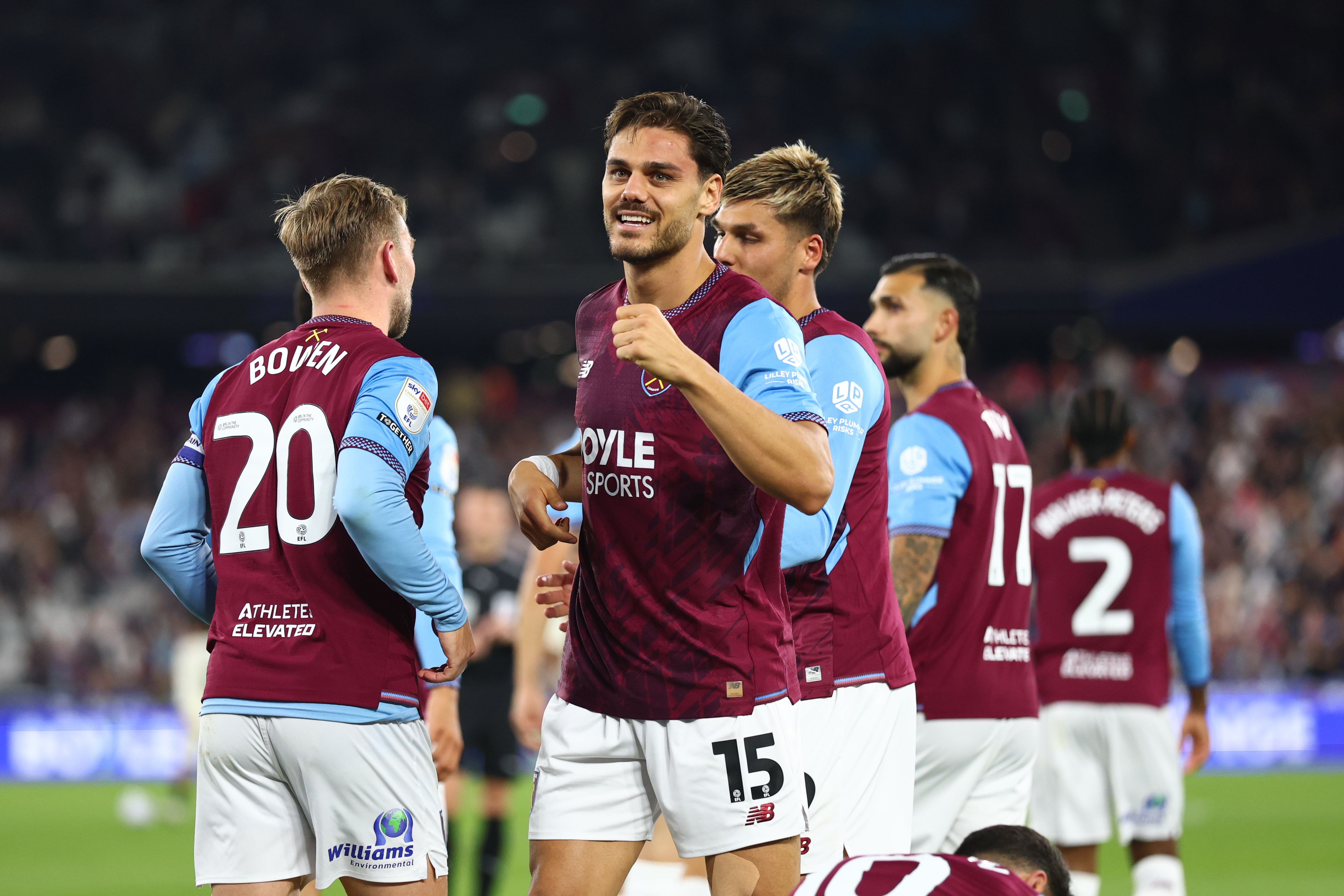 Konstantinos Mavropanos celebrates scoring a goal for West Ham in the home kit