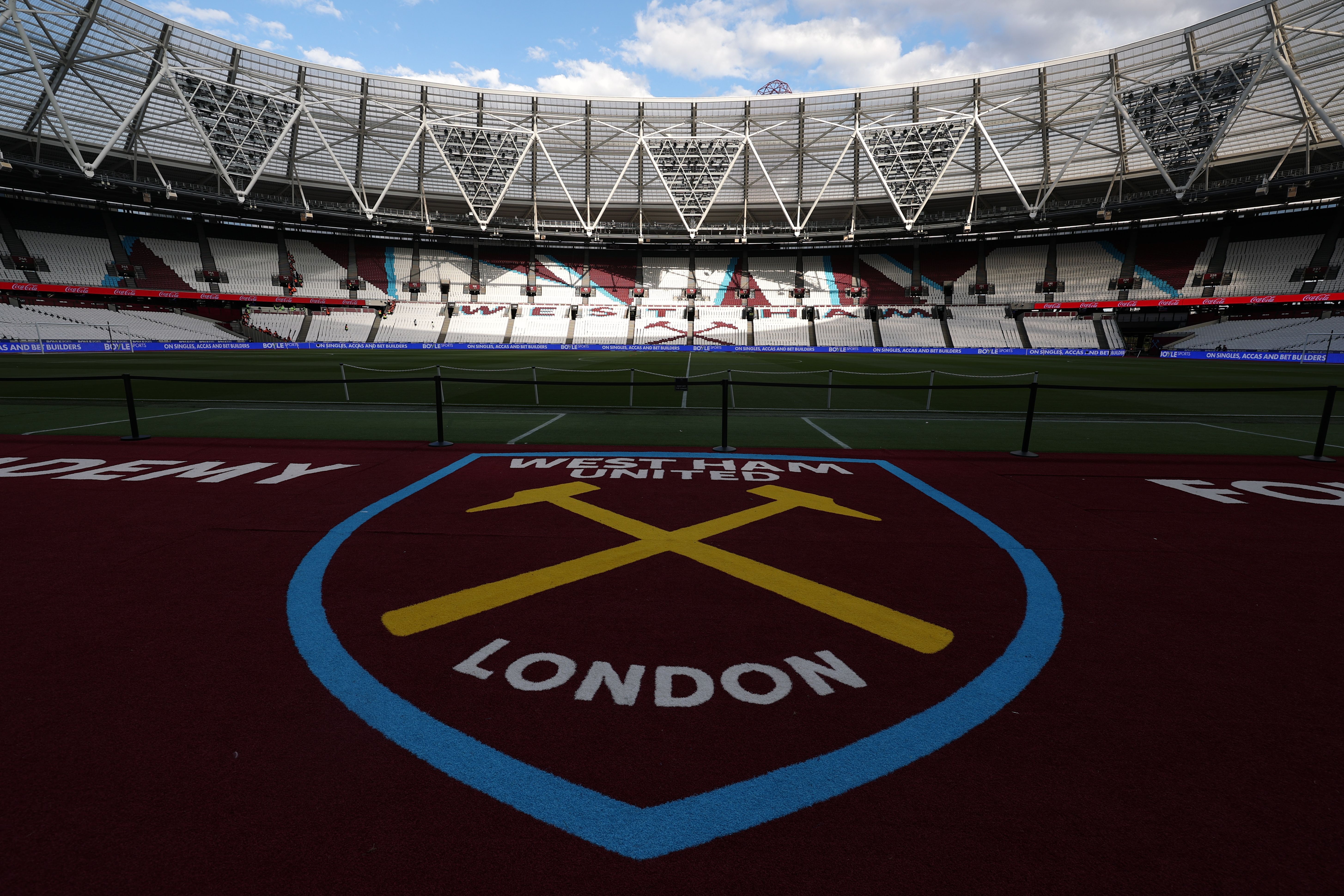 A general view of the London Stadium with a big West Ham badge on the floor 
