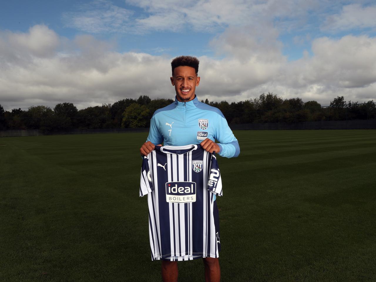 Callum Robinson poses for pictures after joining the Baggies permanently
