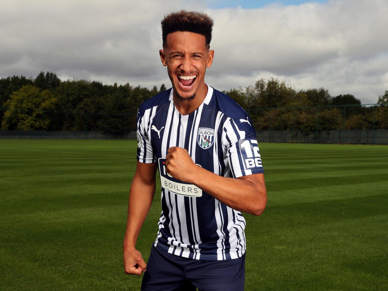 Callum Robinson poses for pictures after joining the Baggies permanently