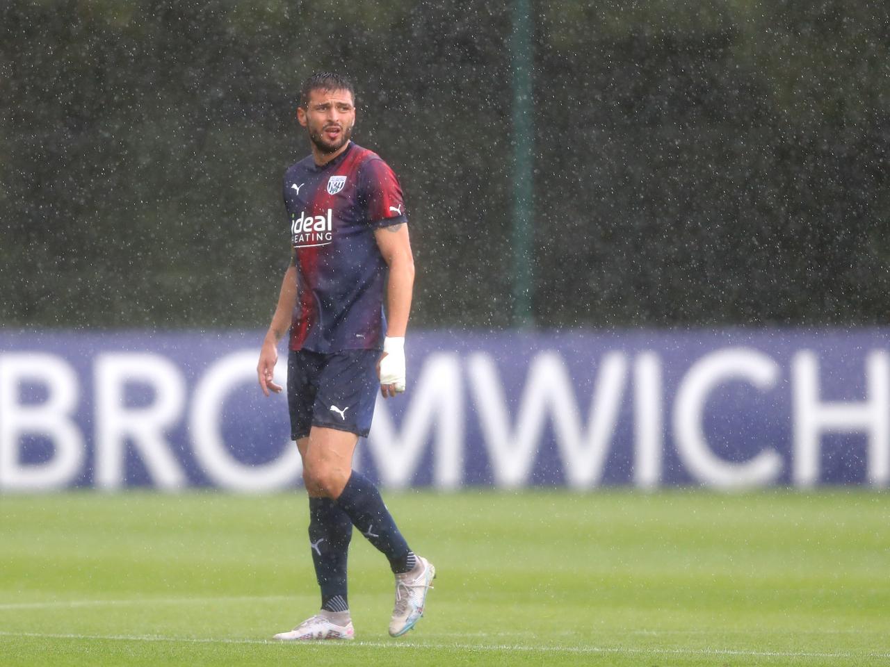 An image of Okay Yokuslu against Shrewsbury