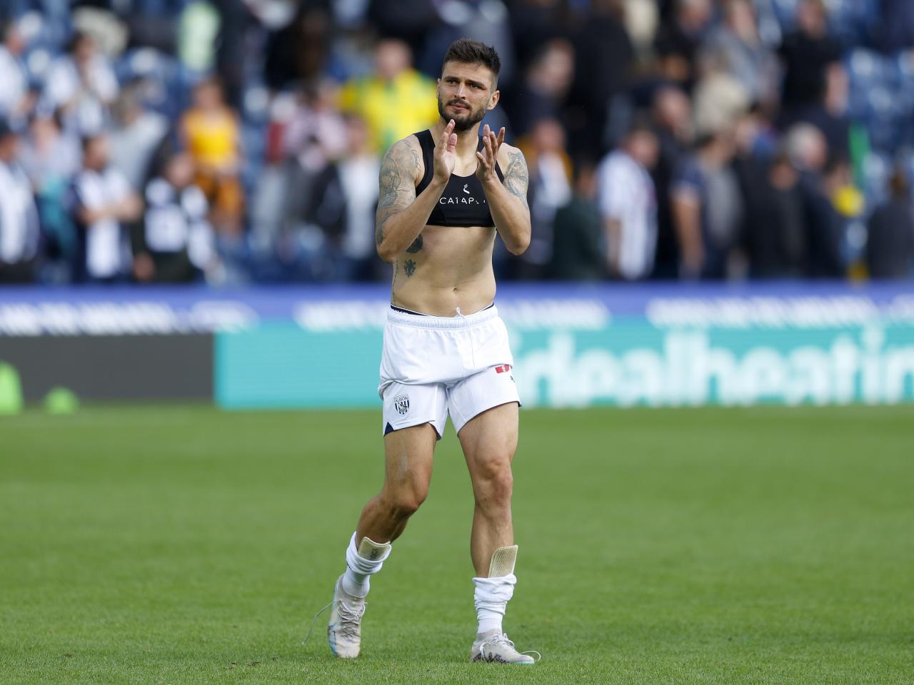 Okay Yokuslu applauds supporters after beating Middlesbrough