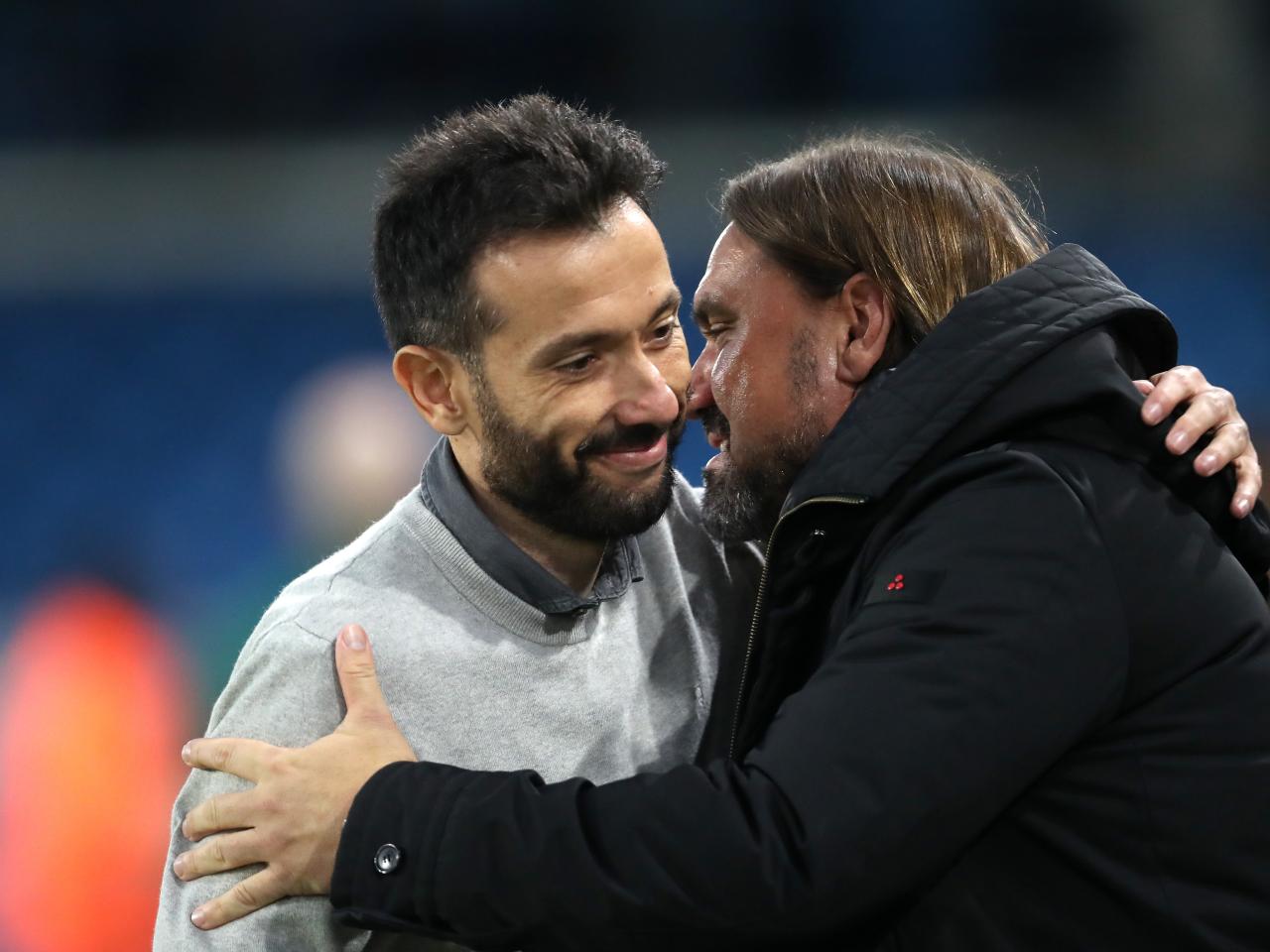 Carlos Corberán and Daniel Farke embrace before the game