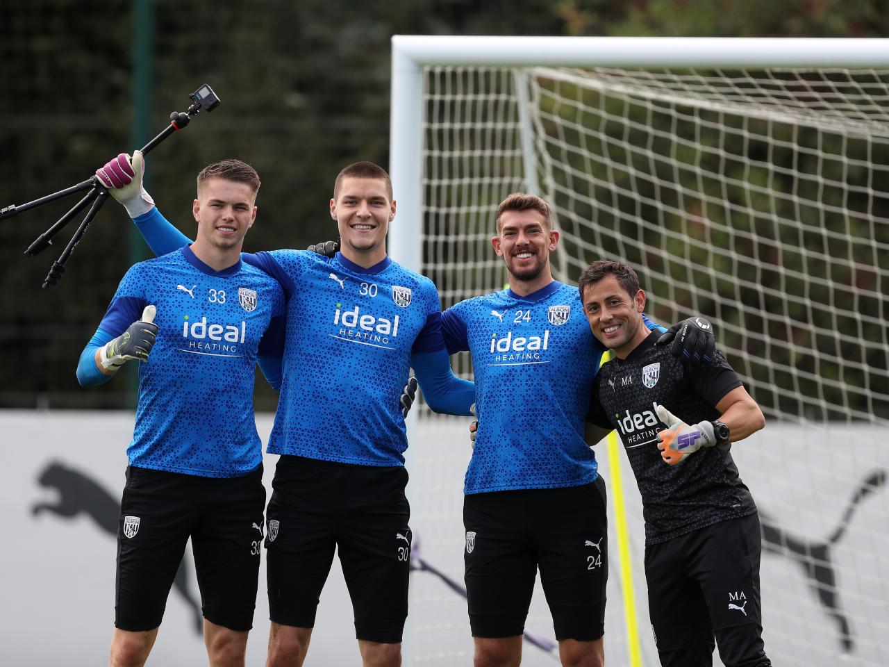 Albion's goalkeepers Ted Cann, Josh Griffiths, Alex Palmer and coach Marcos Abad pose for a photo