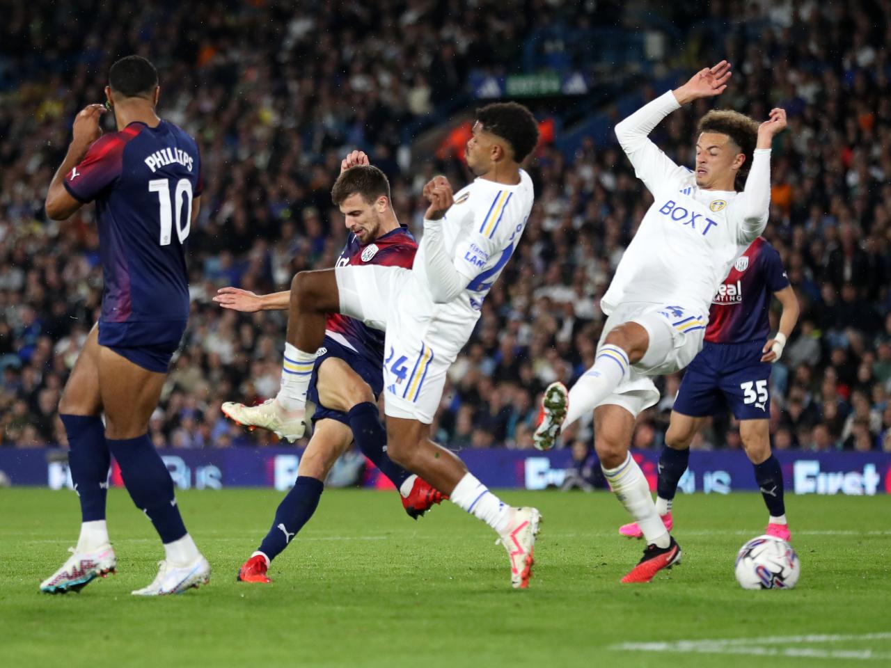 Jayson Molumby shoots at goal